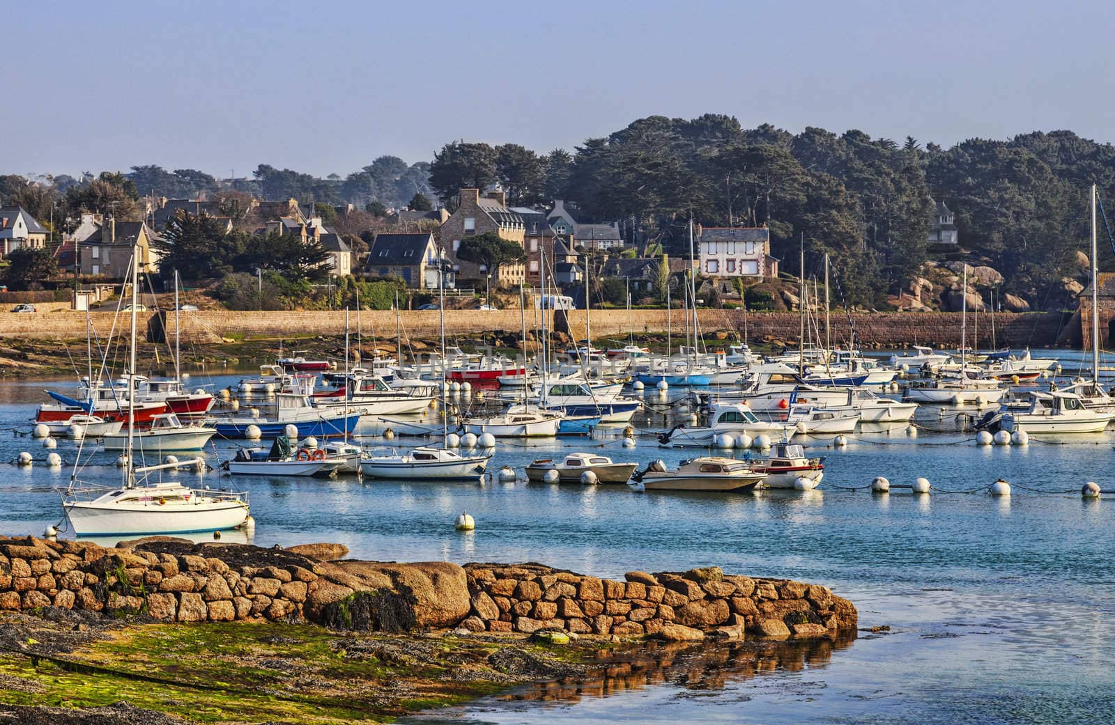 Port of yachts in Brittany (Ploumanach) in vicinity of the Pink Granite Coast in north-west of France.