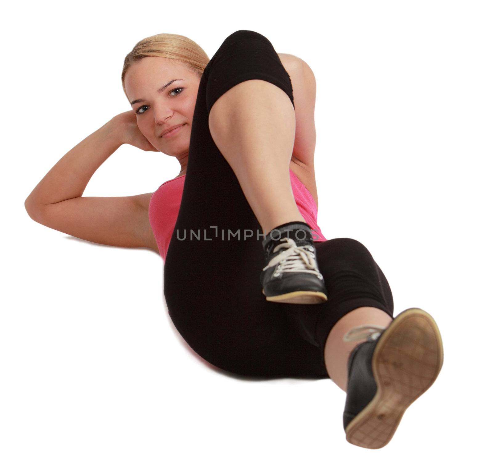 Woman doing sit-ups, isolated against a white background.