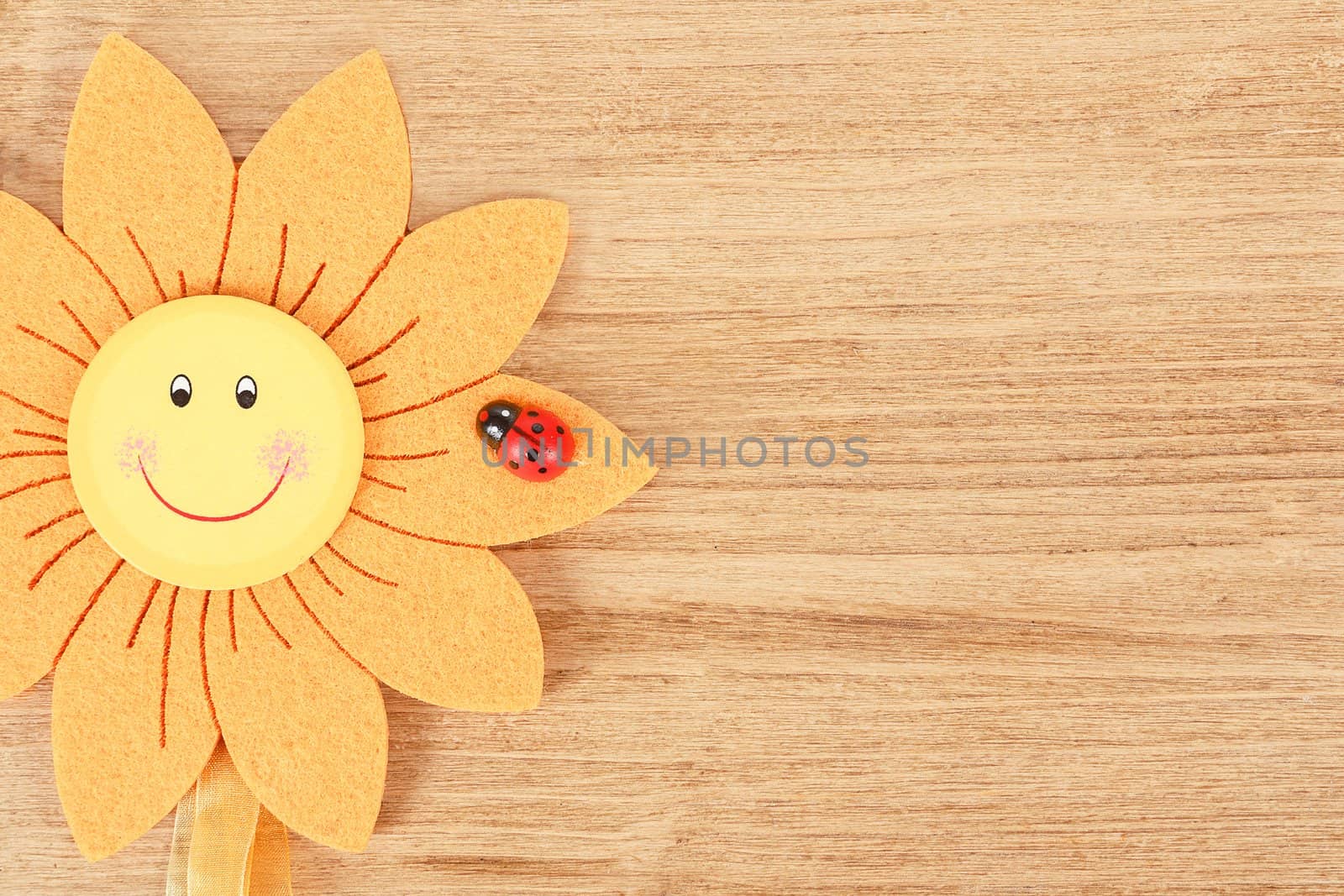 wooden board for spring message with two red hearts and flowers