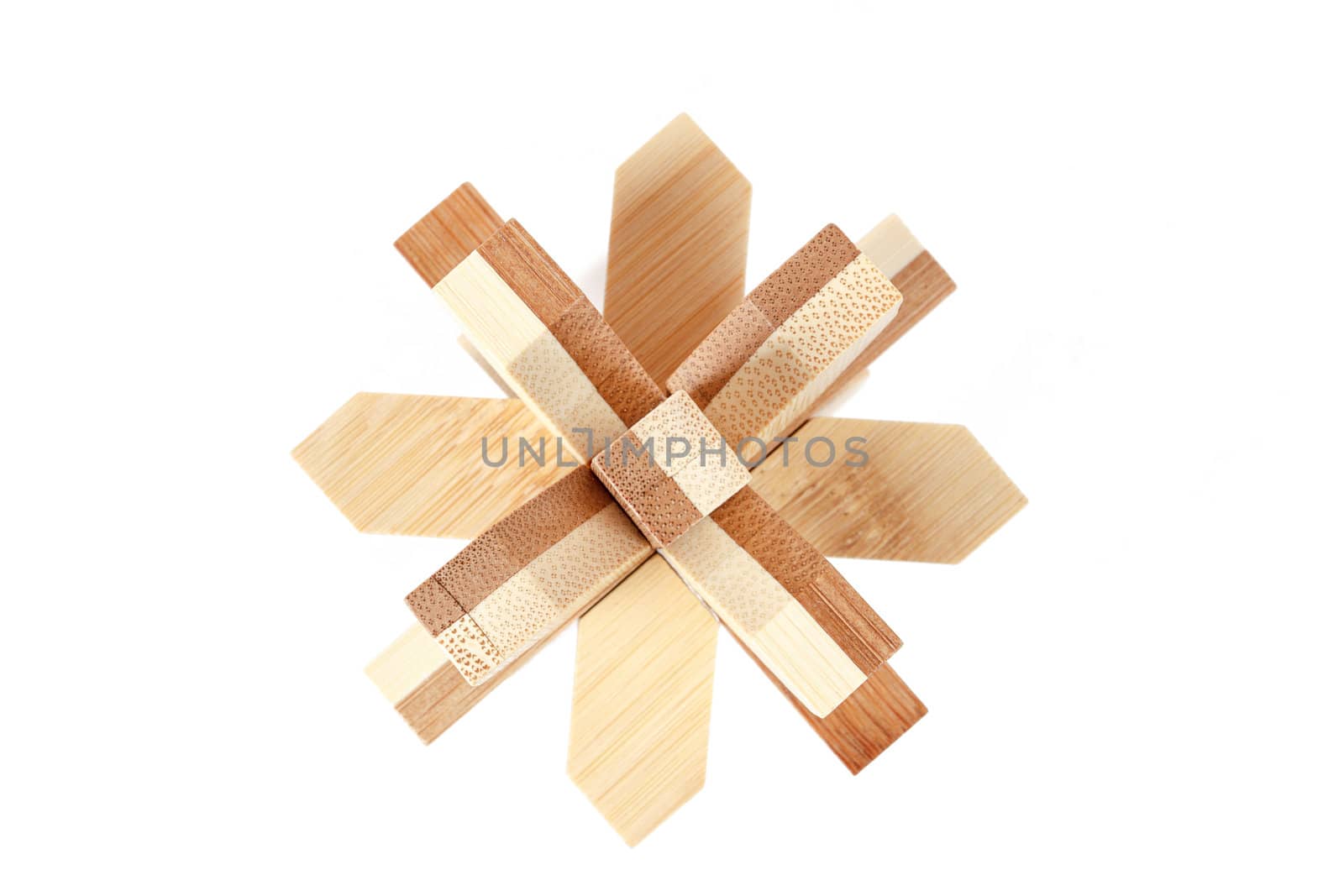 solved wooden puzzle isolated on white background