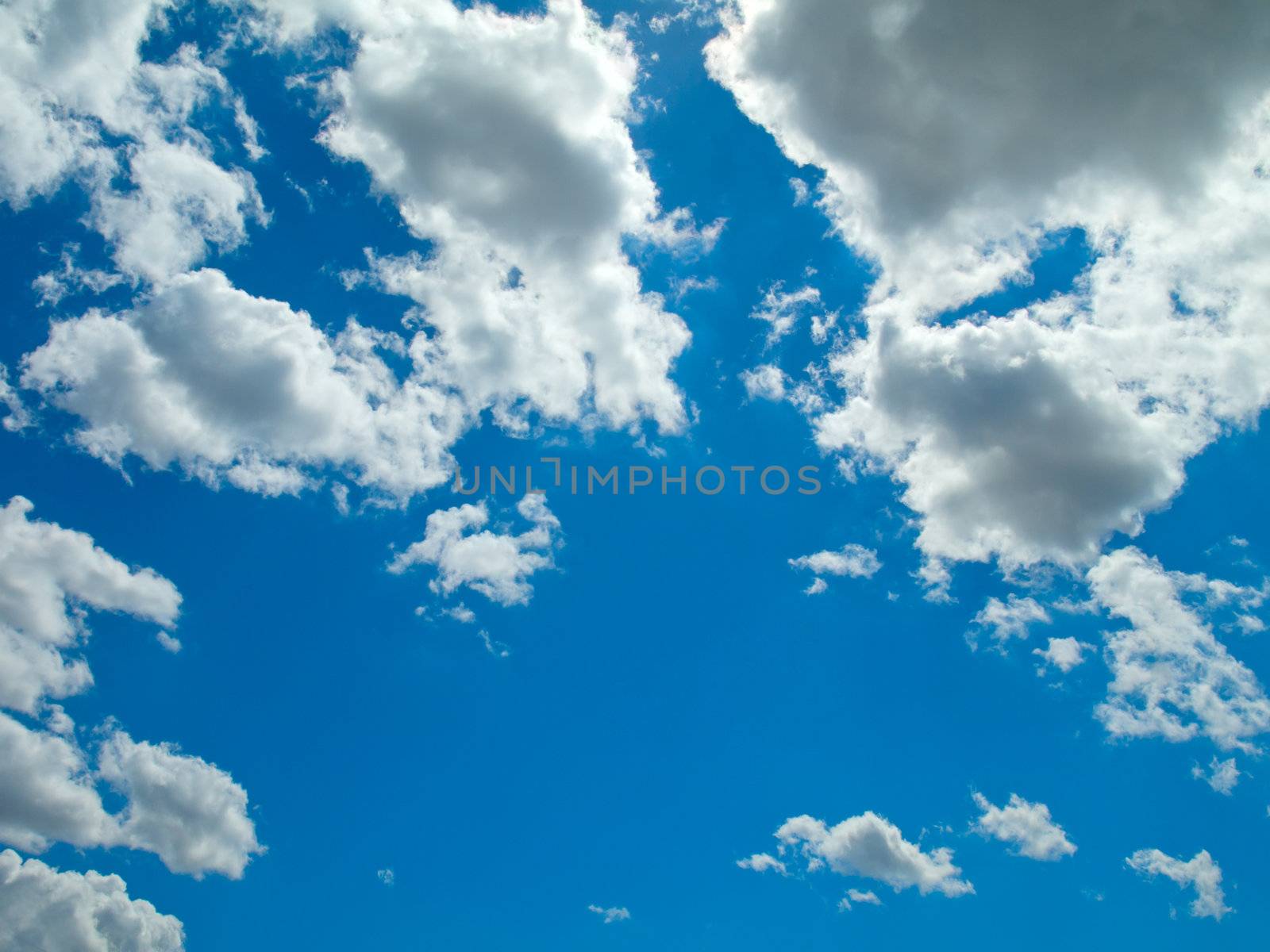 blue sky is covered by white clouds  by motorolka