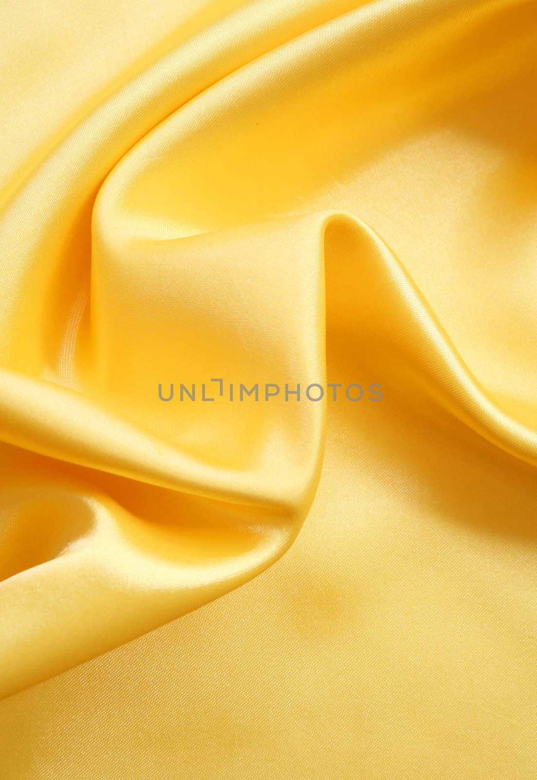 Smooth elegant golden silk can use as background 