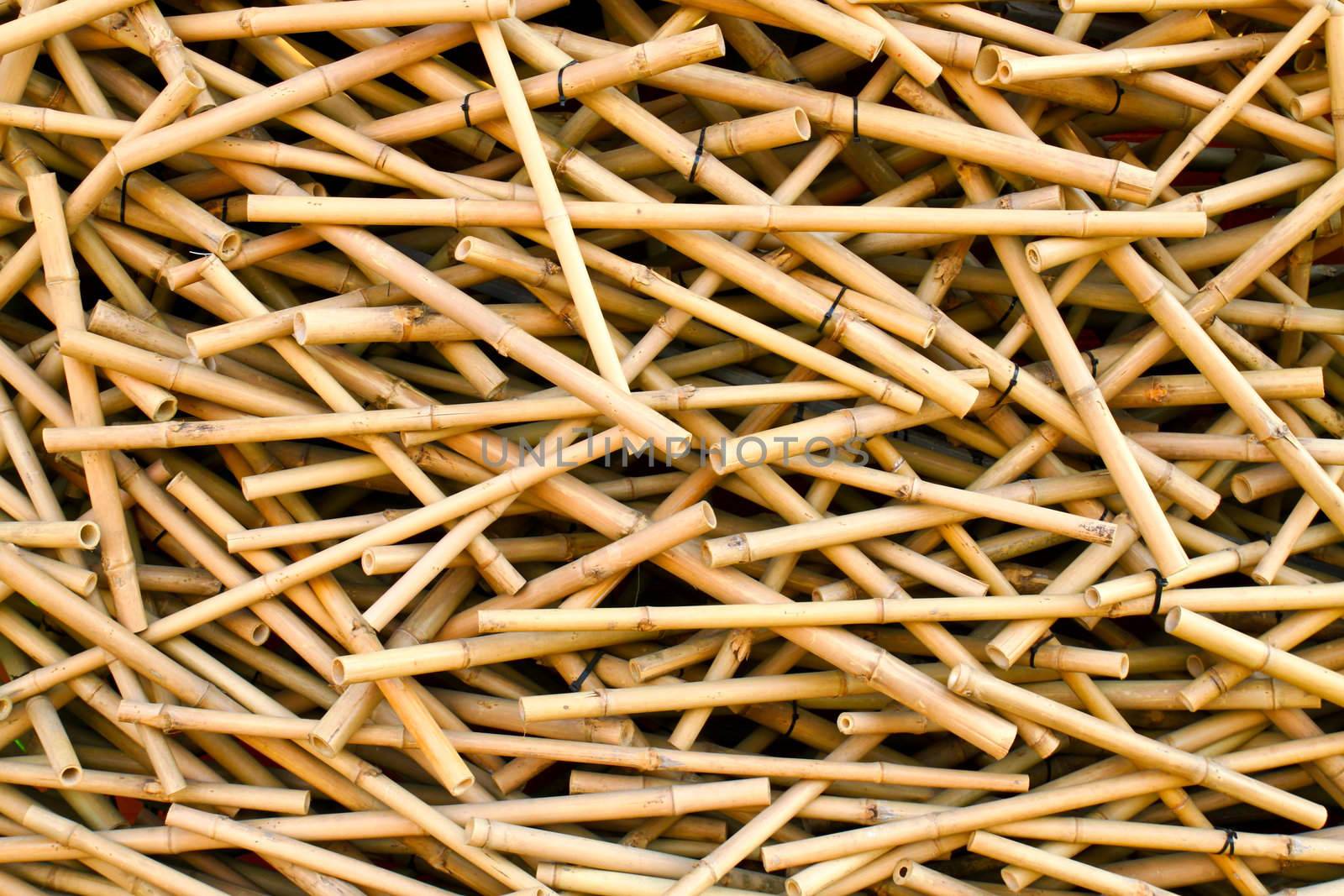 Group of messy bamboo sticks by nuchylee