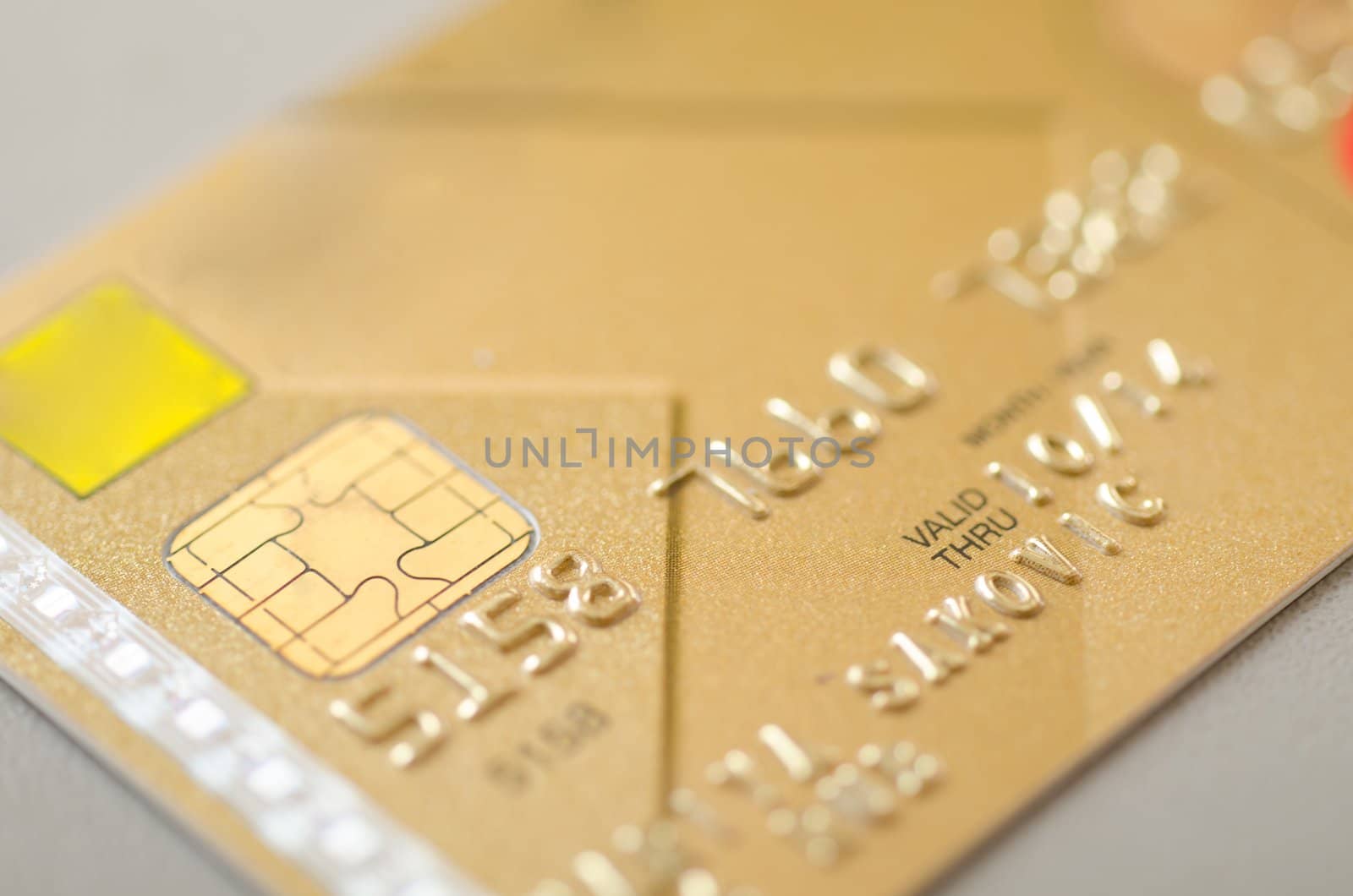 Gold bank card, macro, narrow focus