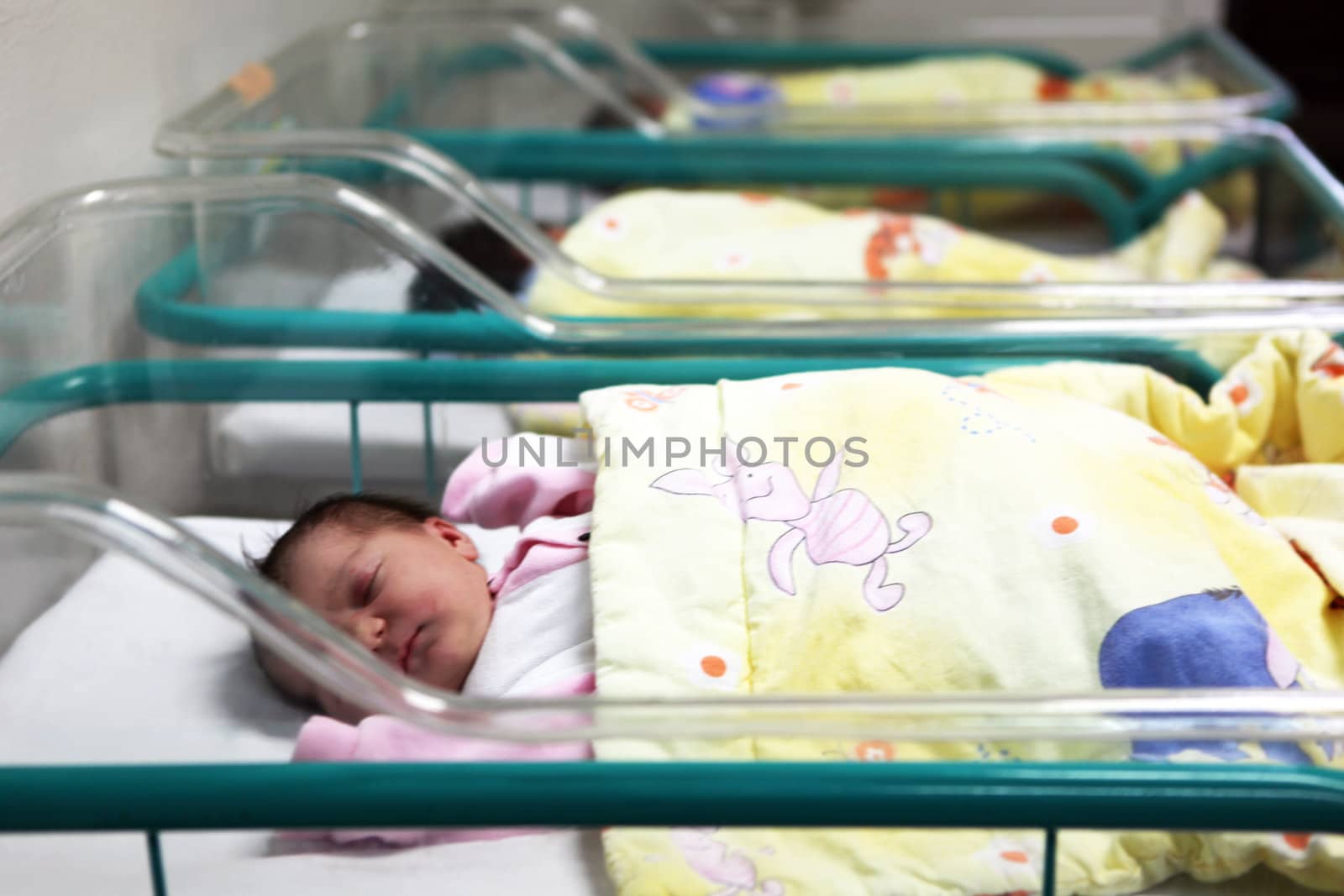 Newborn baby inside incubator