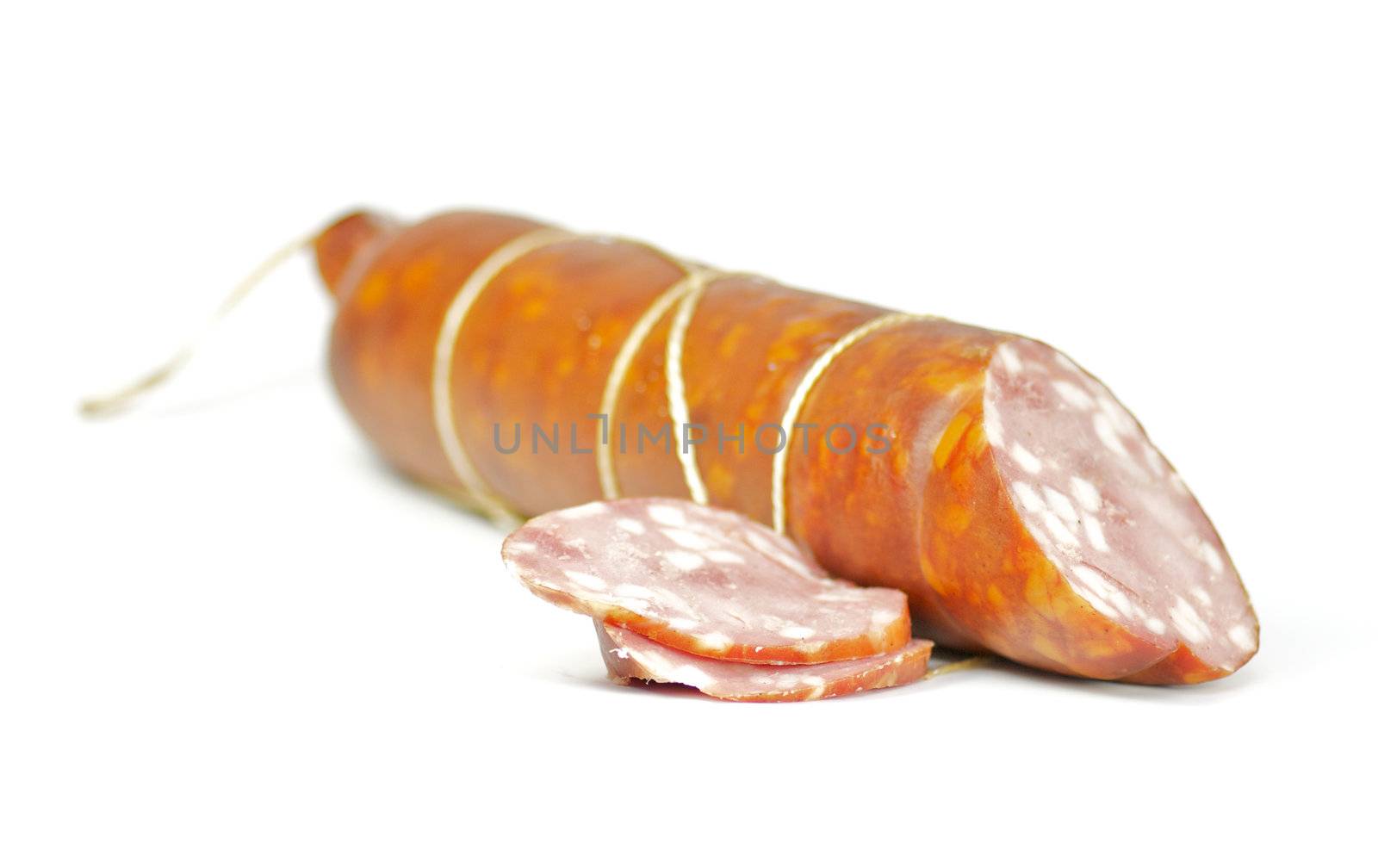 Sausage long loaf with one piece of sausage on white background