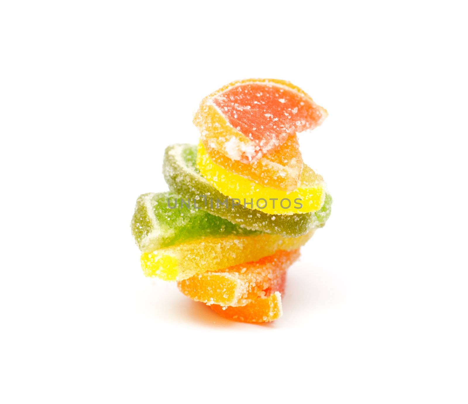 Multi colored fruit jelly candy on white background