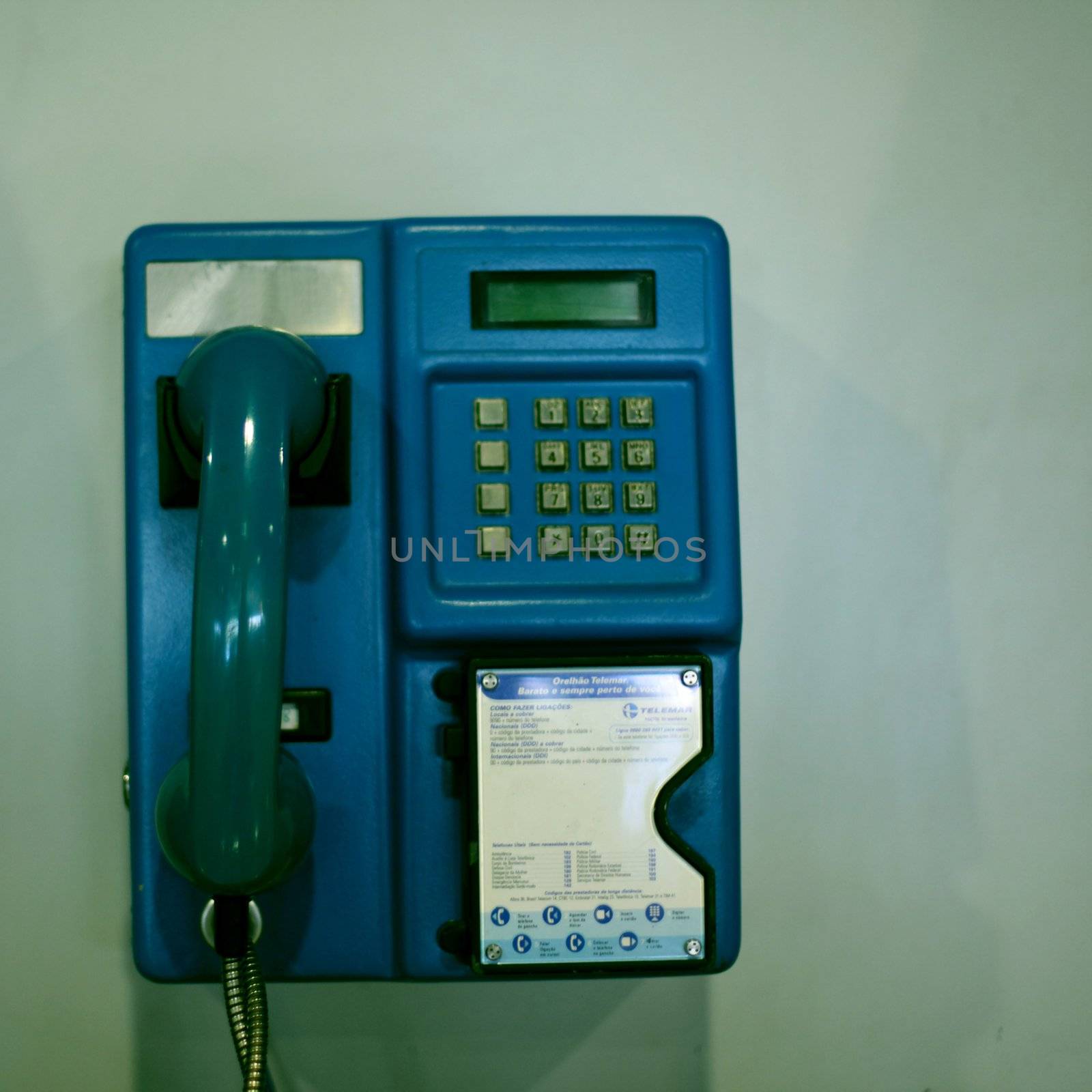 old phone on the wall in airport