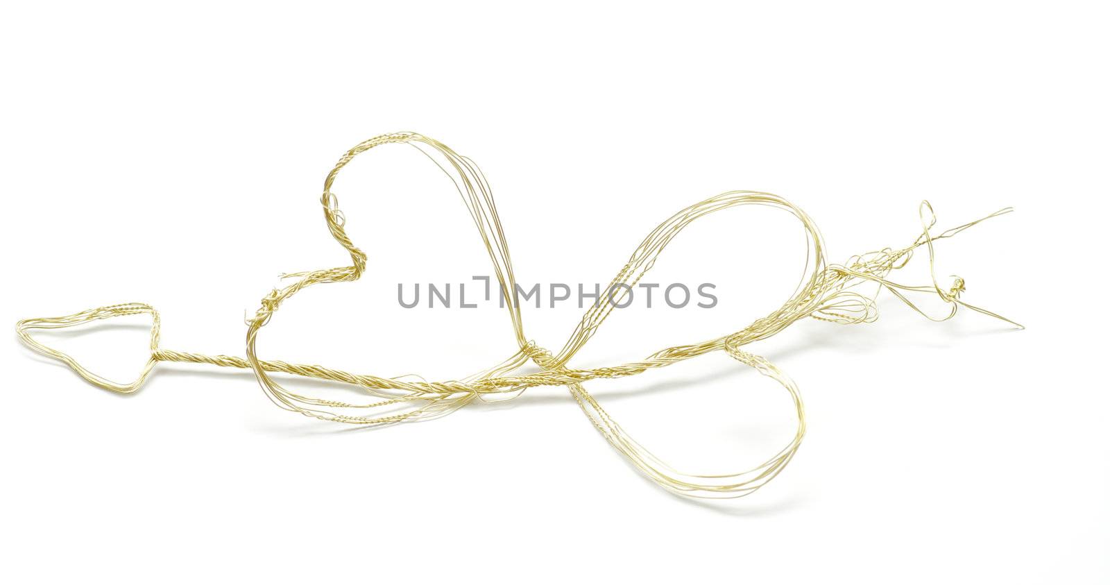 Handmade Gold Hearts and Cupid' arrow isolated on white background