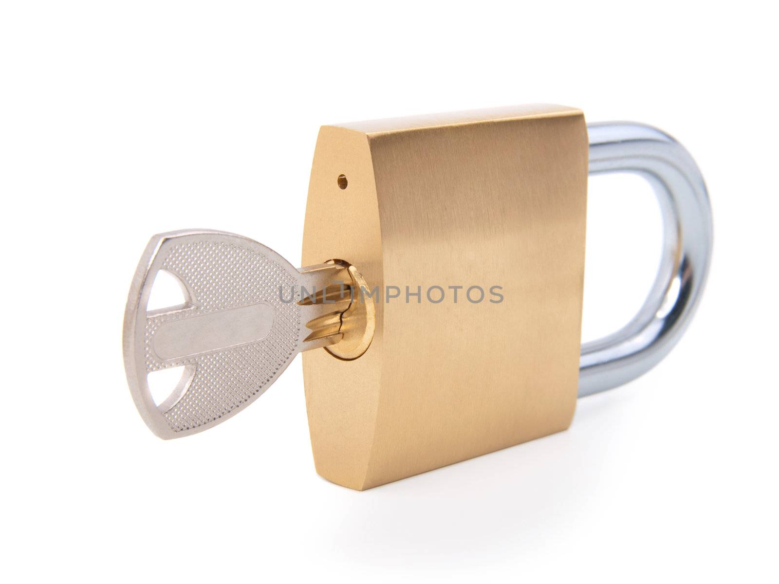 golden closed padlock with key 