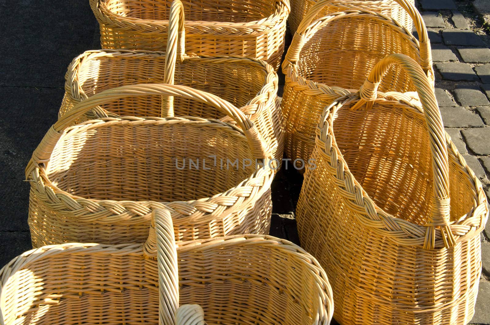 Wicker hand made baskets selling in outdoor fair.