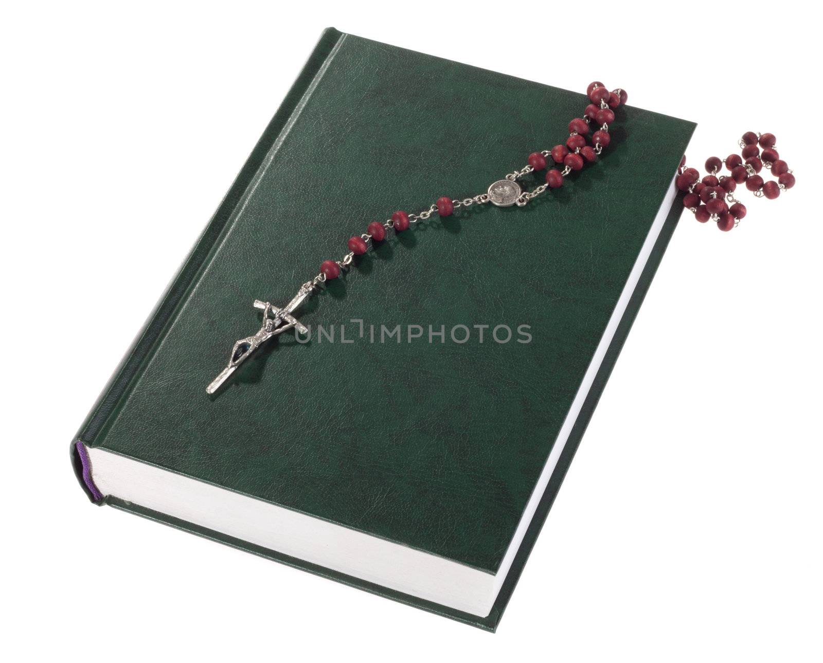 rosary on the Bible by aguirre_mar