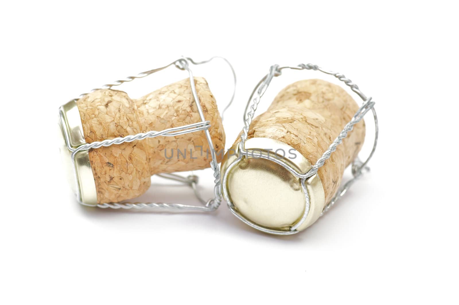 Two Cortical champagne corks on white background