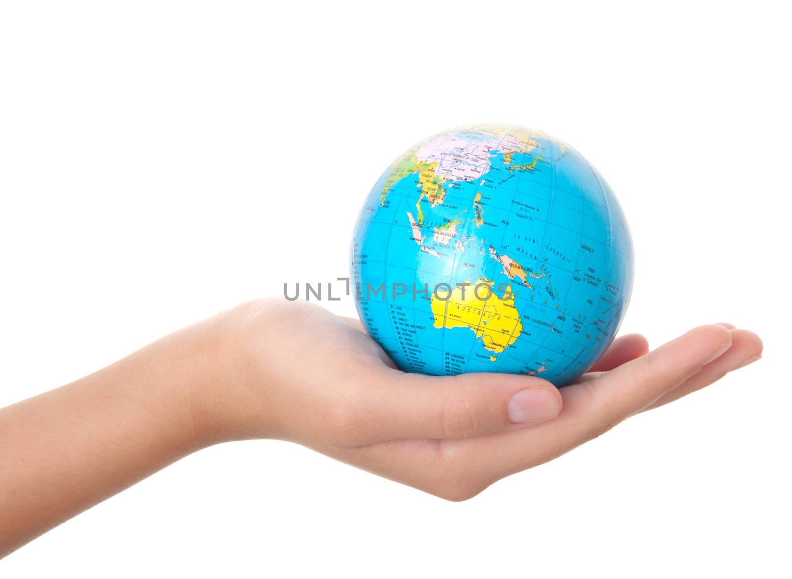 globe in the teenager hand, isolated on white 
