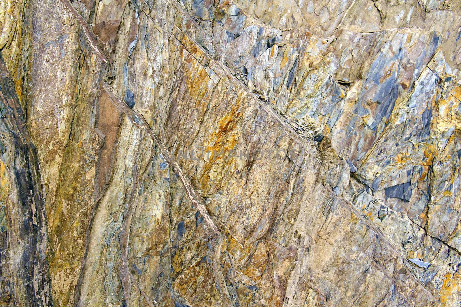 stone rock with cracks in the background