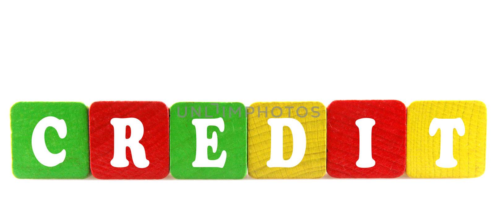 credit - isolated text in wooden building blocks