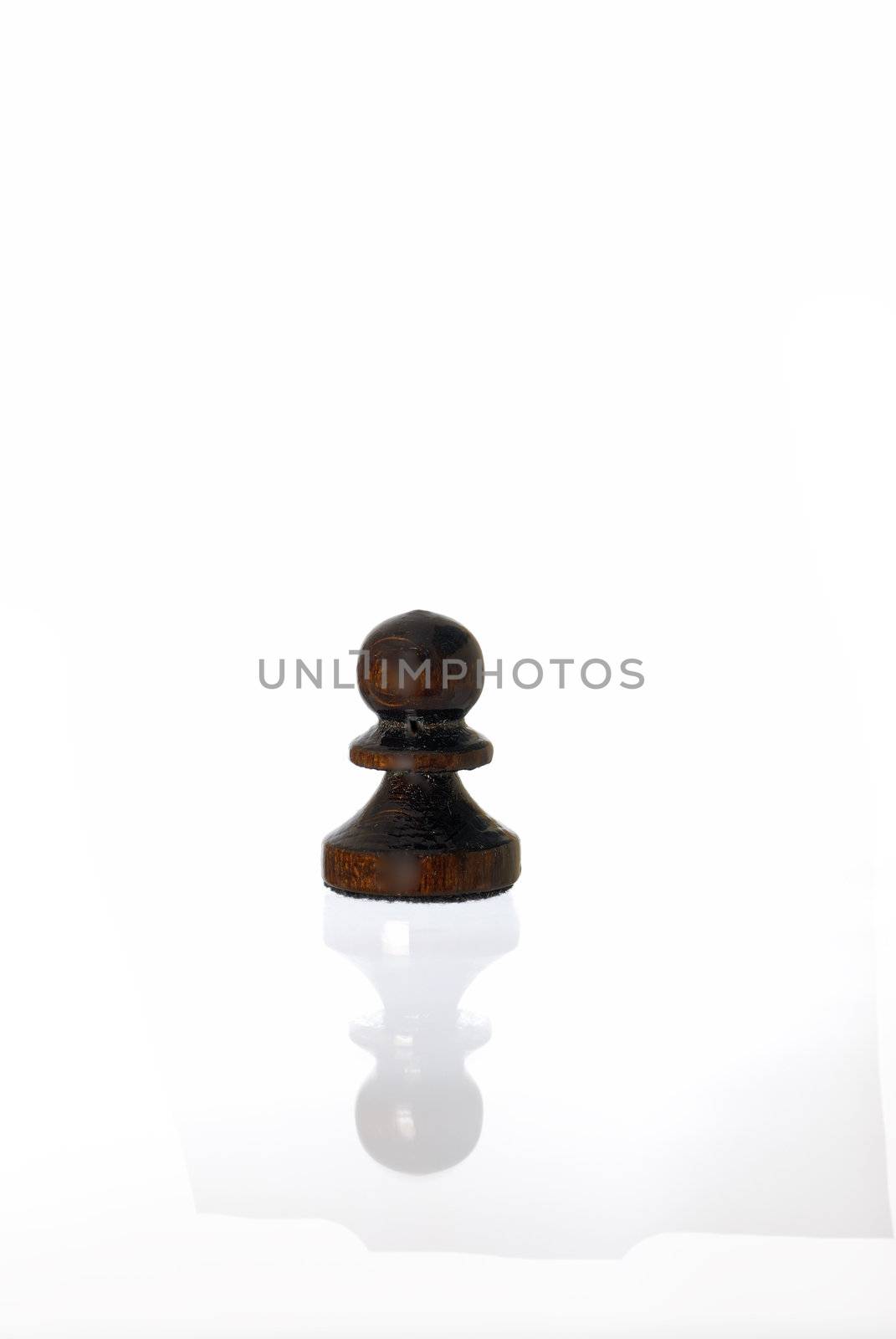 One Chess Pawn on white background with faint reflextion.