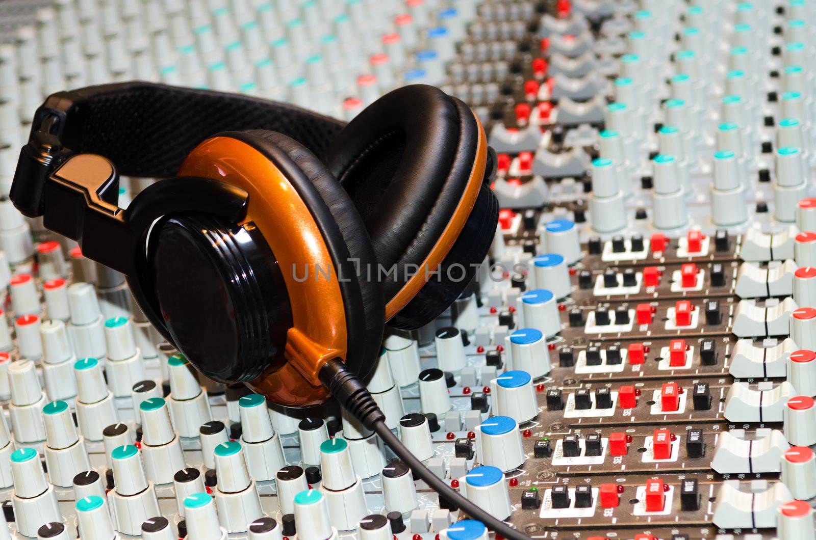headphones on a mixing desk