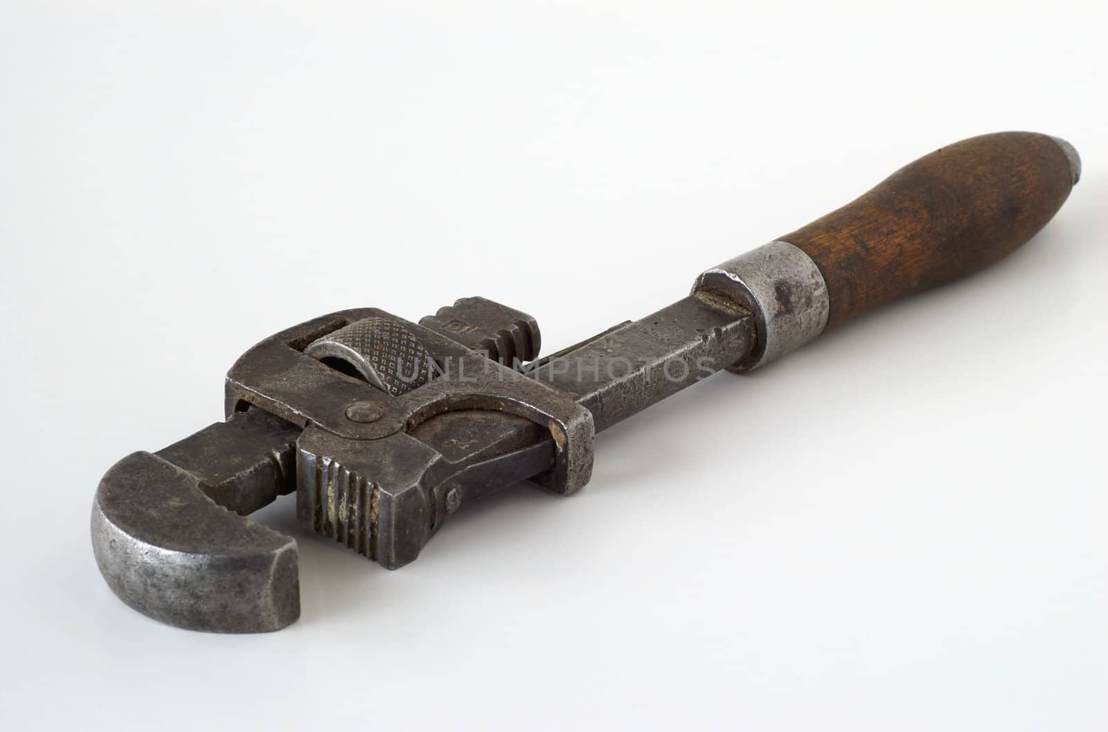 Antique pipe wrench used by a plumber or pipefitter.