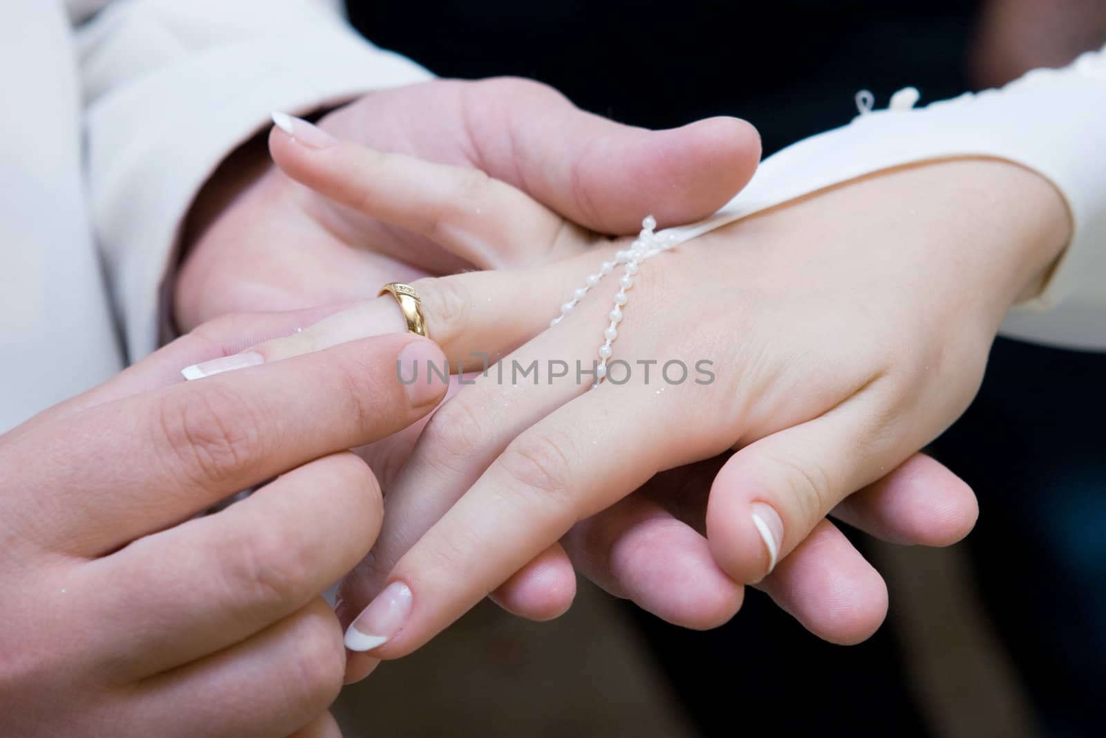 putting on wedding ring