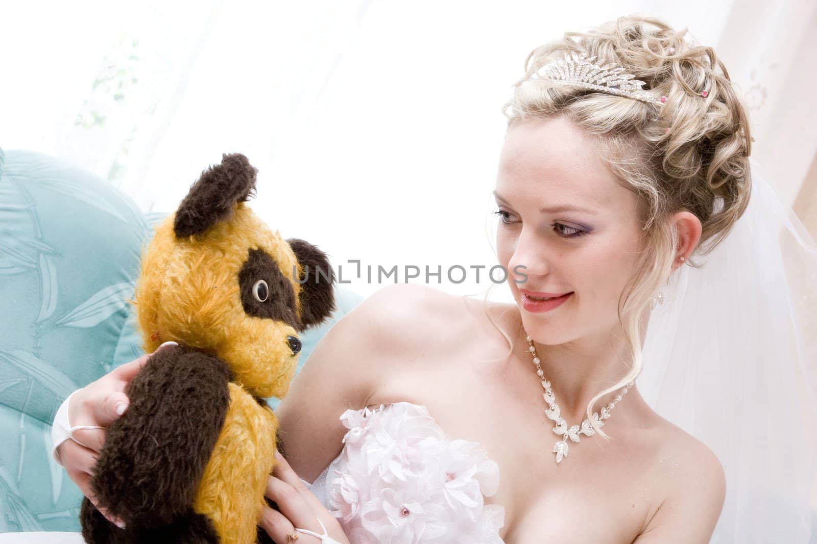 bride with a toy from her childhood by vsurkov