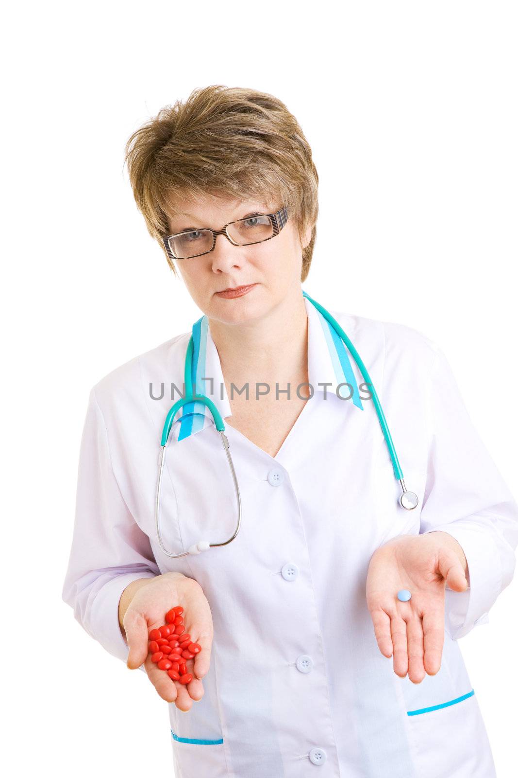 different pills in hands of doctor