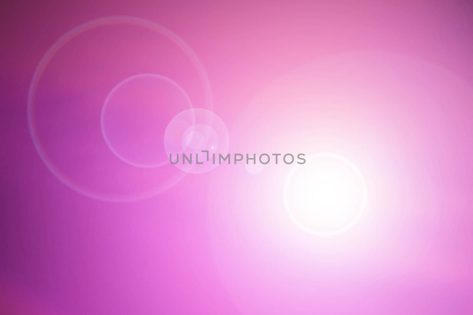 Pink background with lens flare