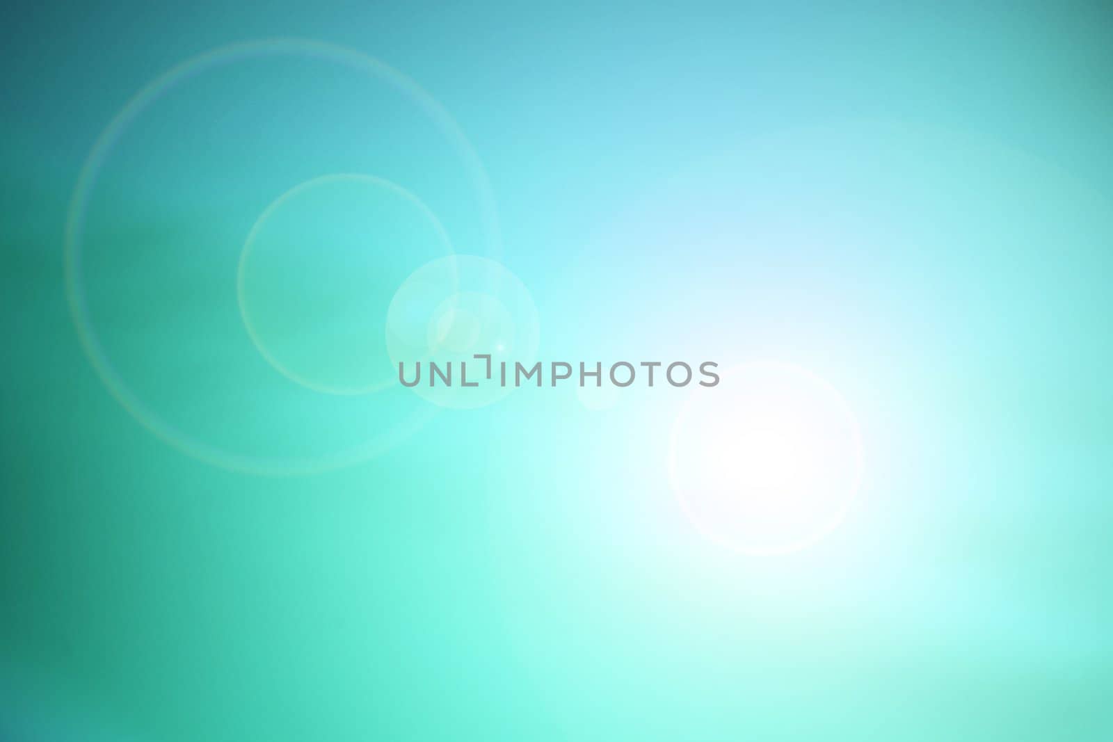 Sky blue background with lens flare