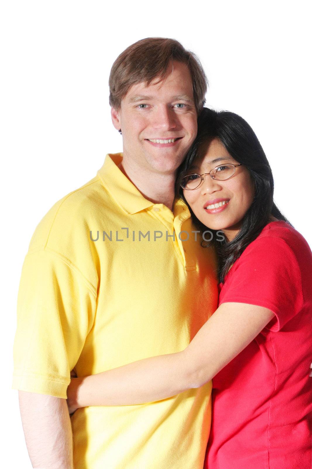 Young family isolated on white. Husband is caucasian Scandinavian descent, wife is Thai.