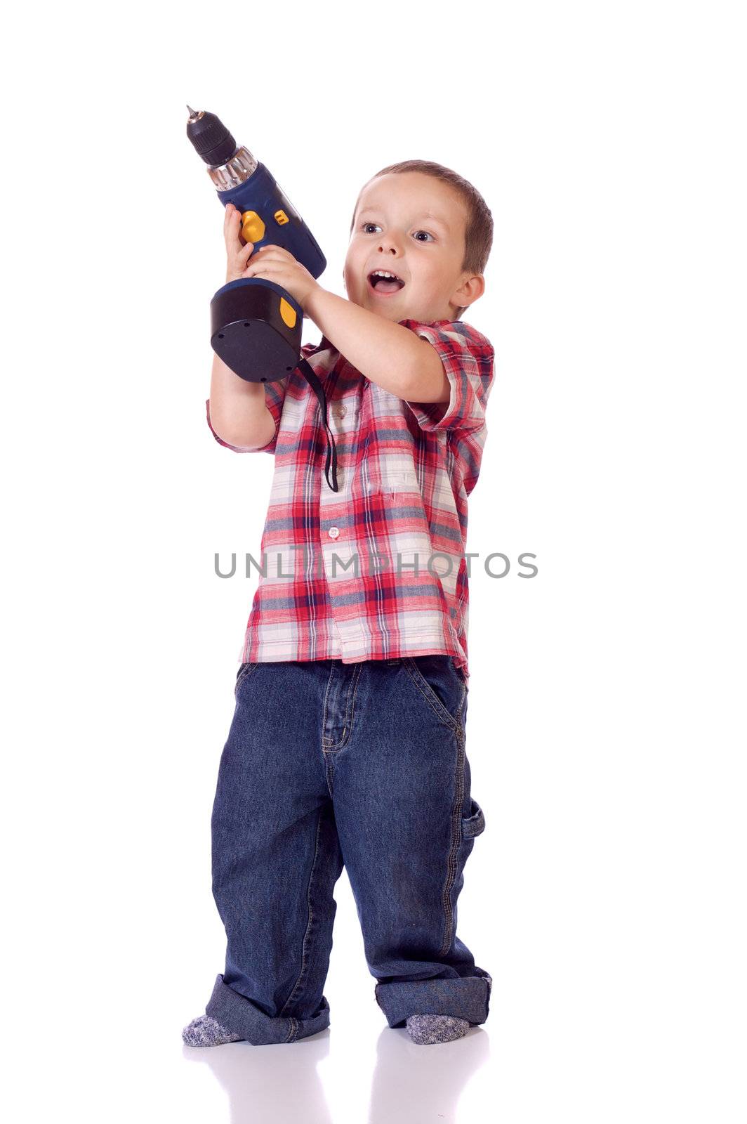 Cute little boy with a drill