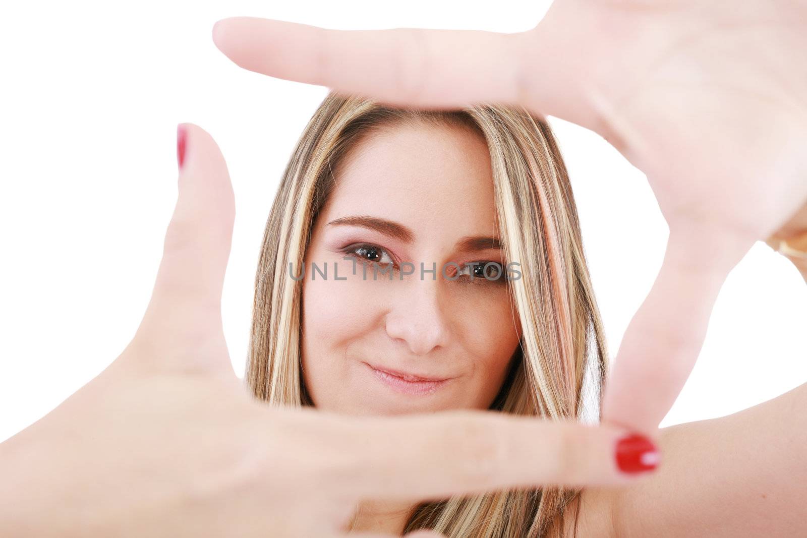Young attractive woman framing her hands, clear vision, isolated by dacasdo