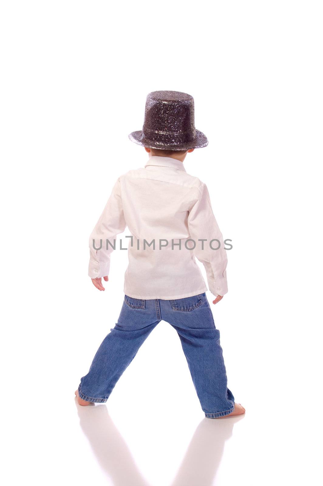 Little boy with a hat dancing