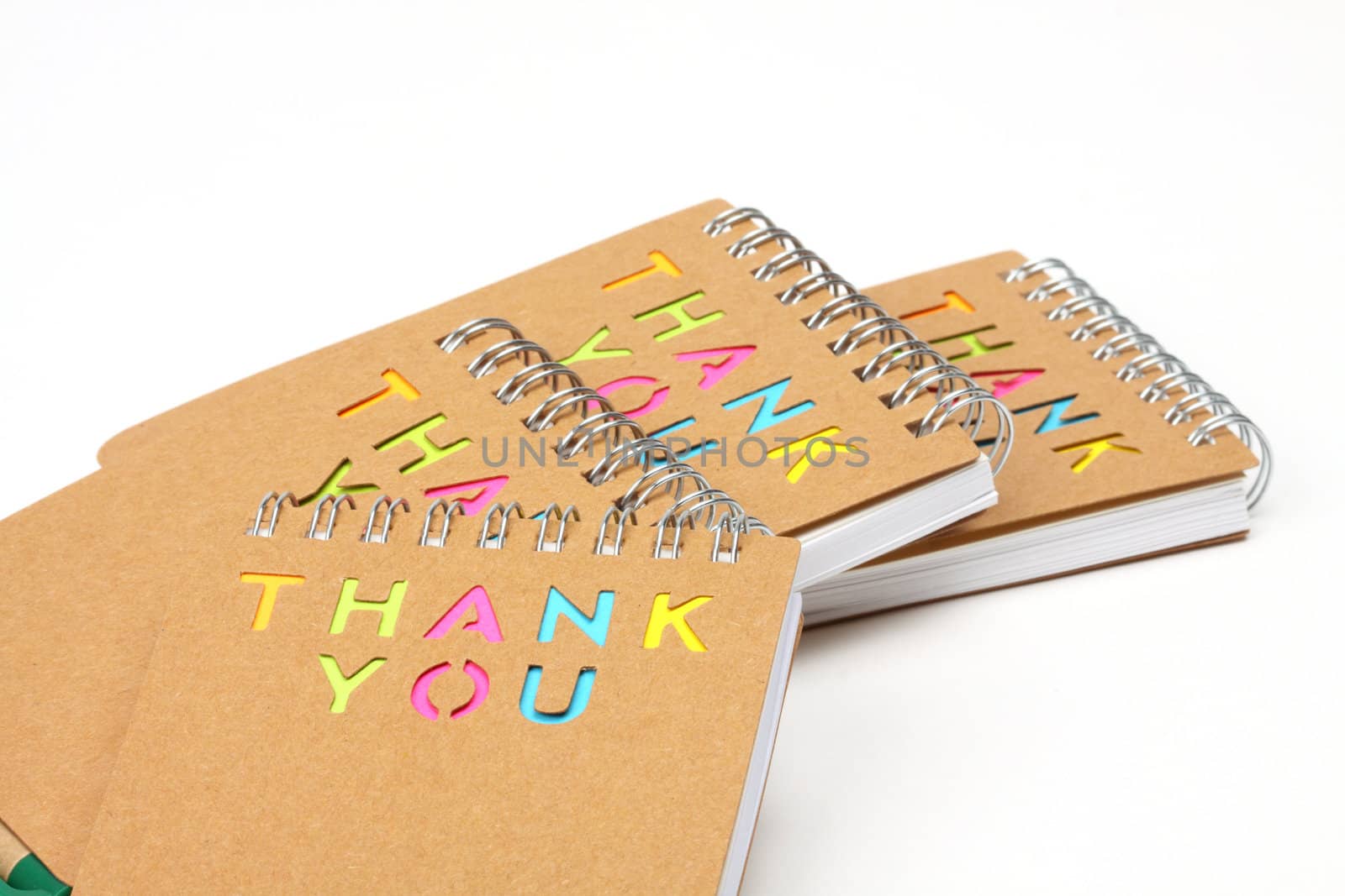 Notebook with the words thank you cut the cover. Recycle notebook concept 