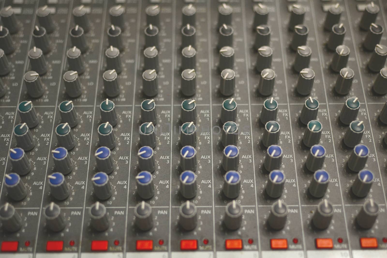 close up shot of an sound mixer buttons