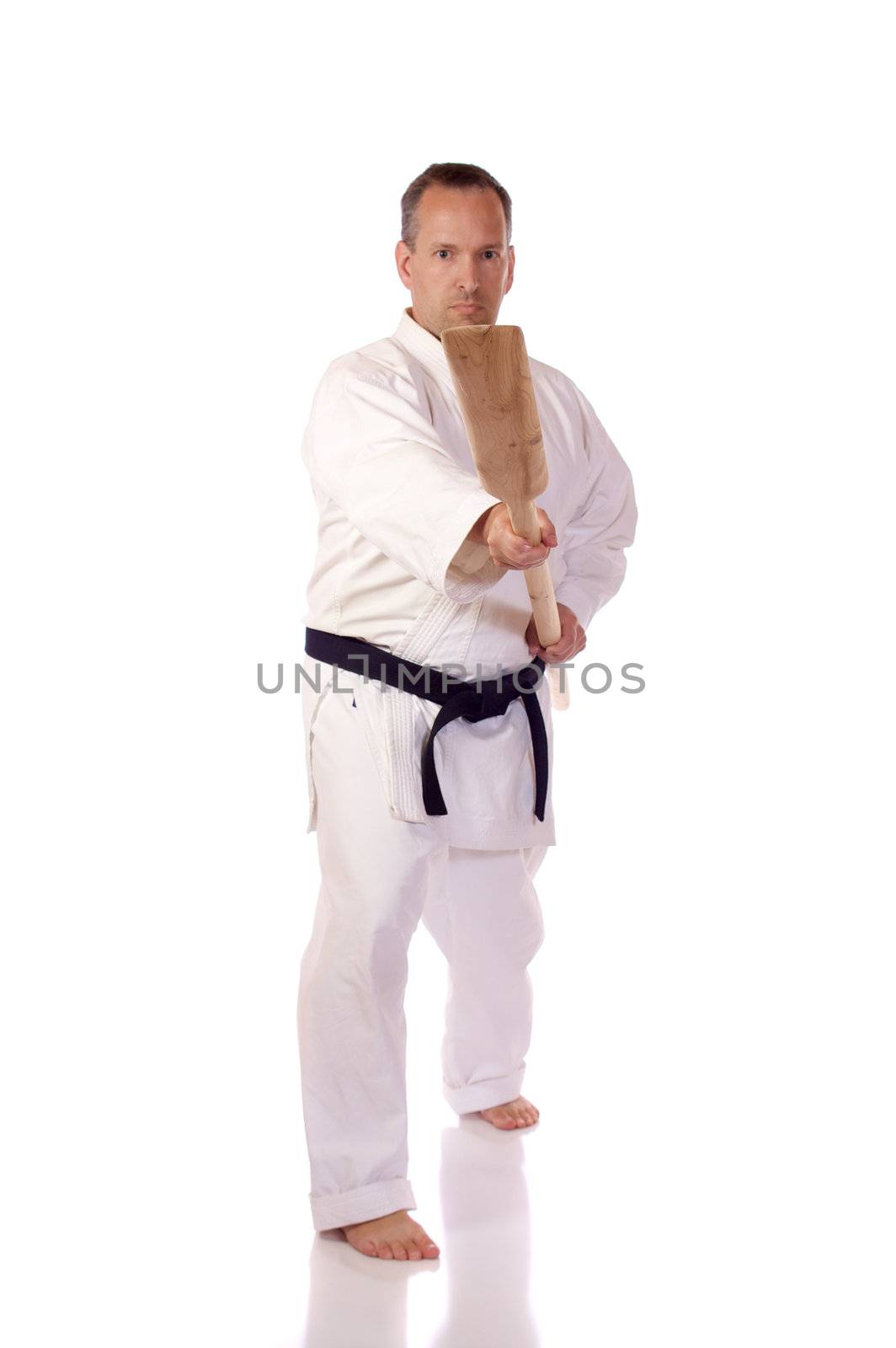 Man in karate-gi holding a kai
