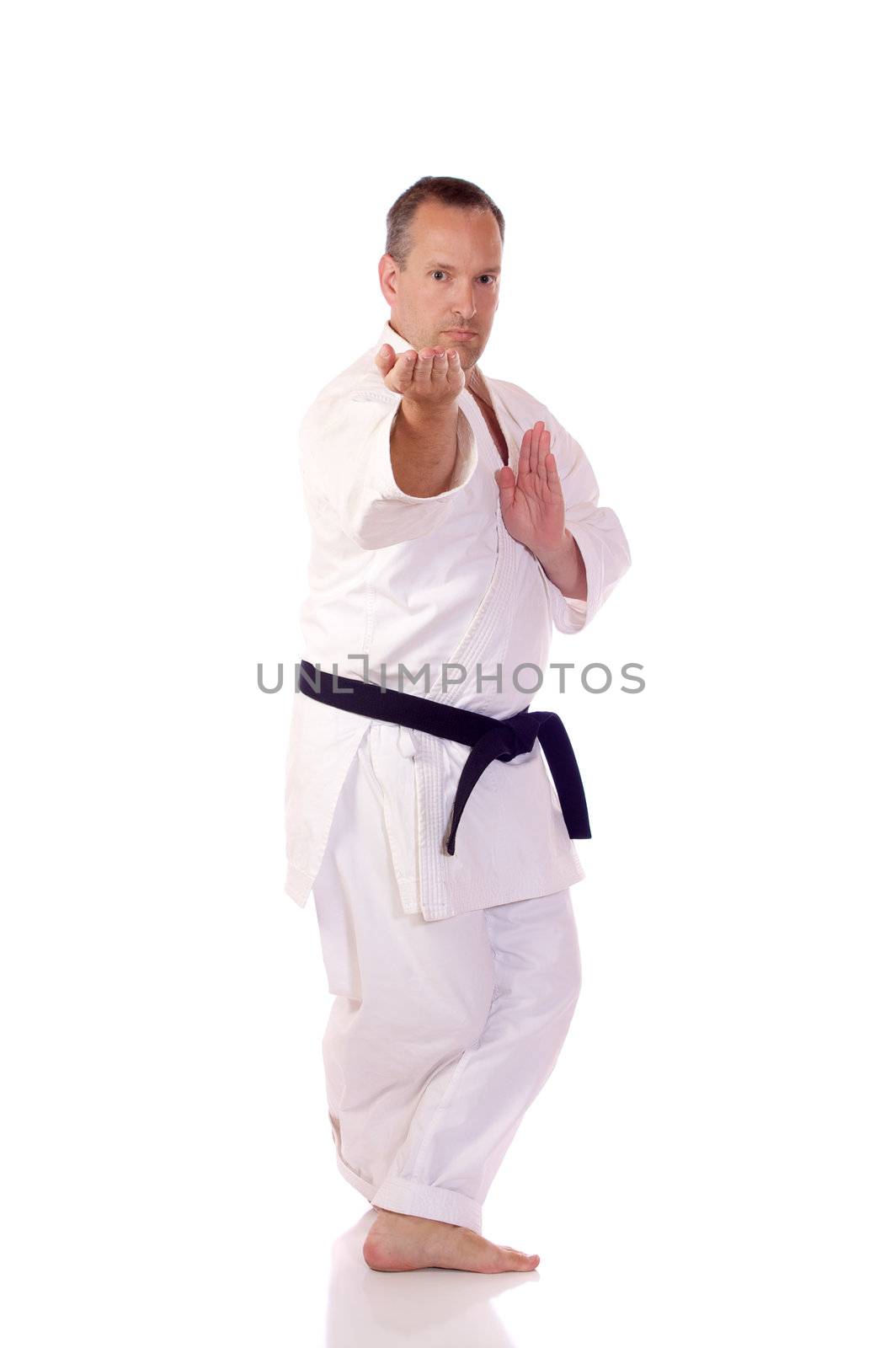 Man in traditional clothing doing karate