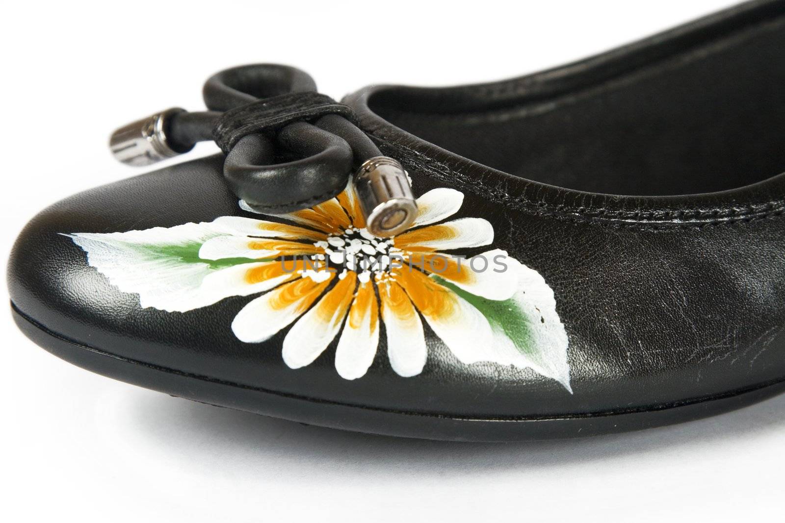 black women shoes with printed flower on white background