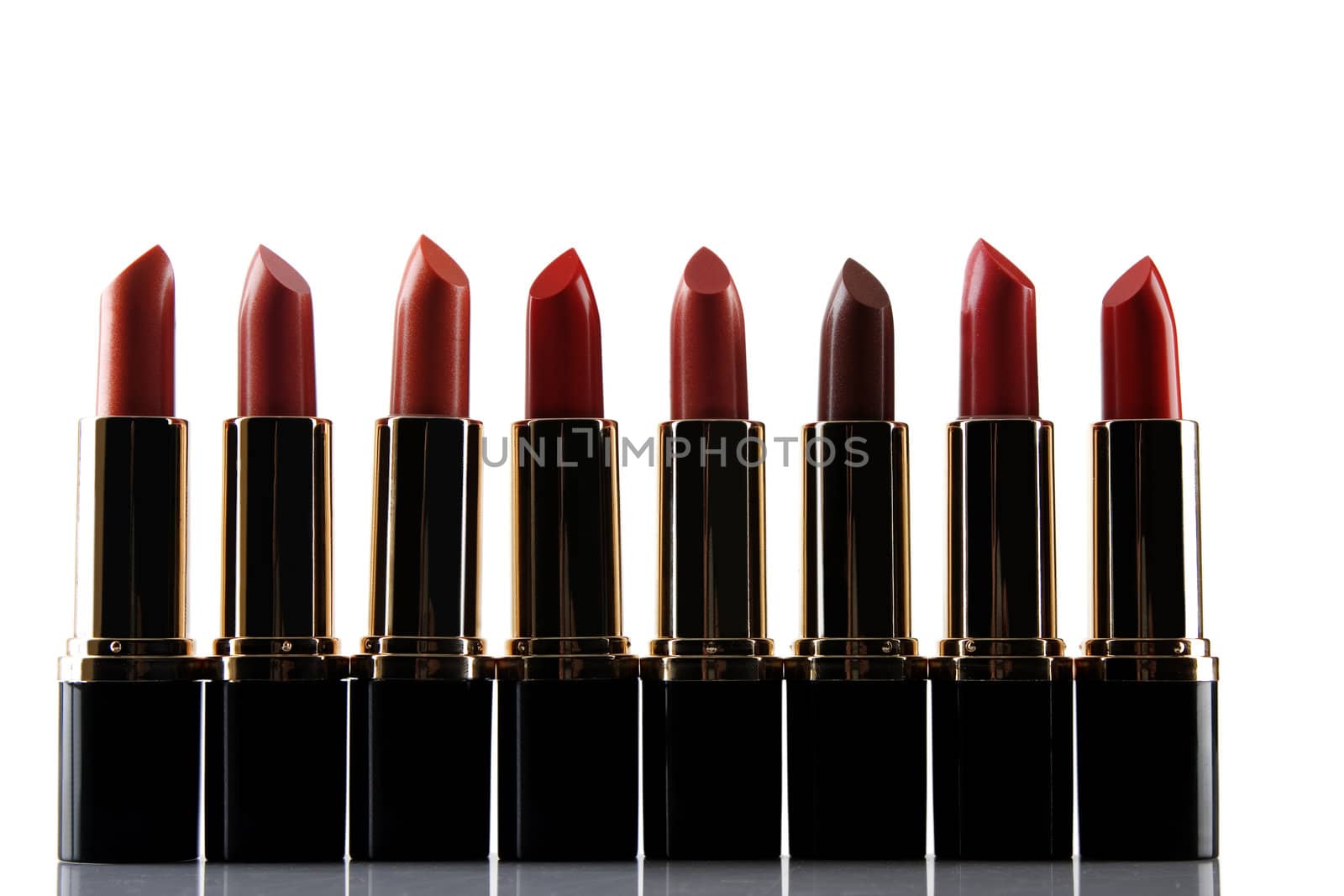 different red lipstick isolated on white background 