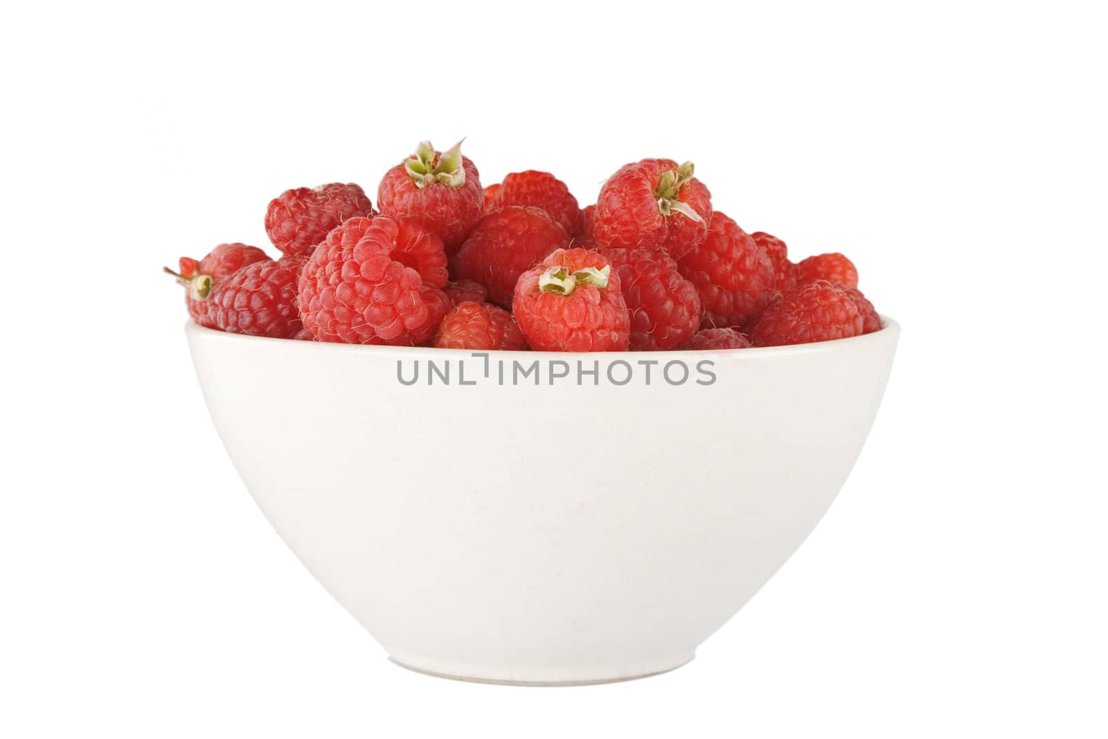 front view of full bowl with ripe raspberry on white background