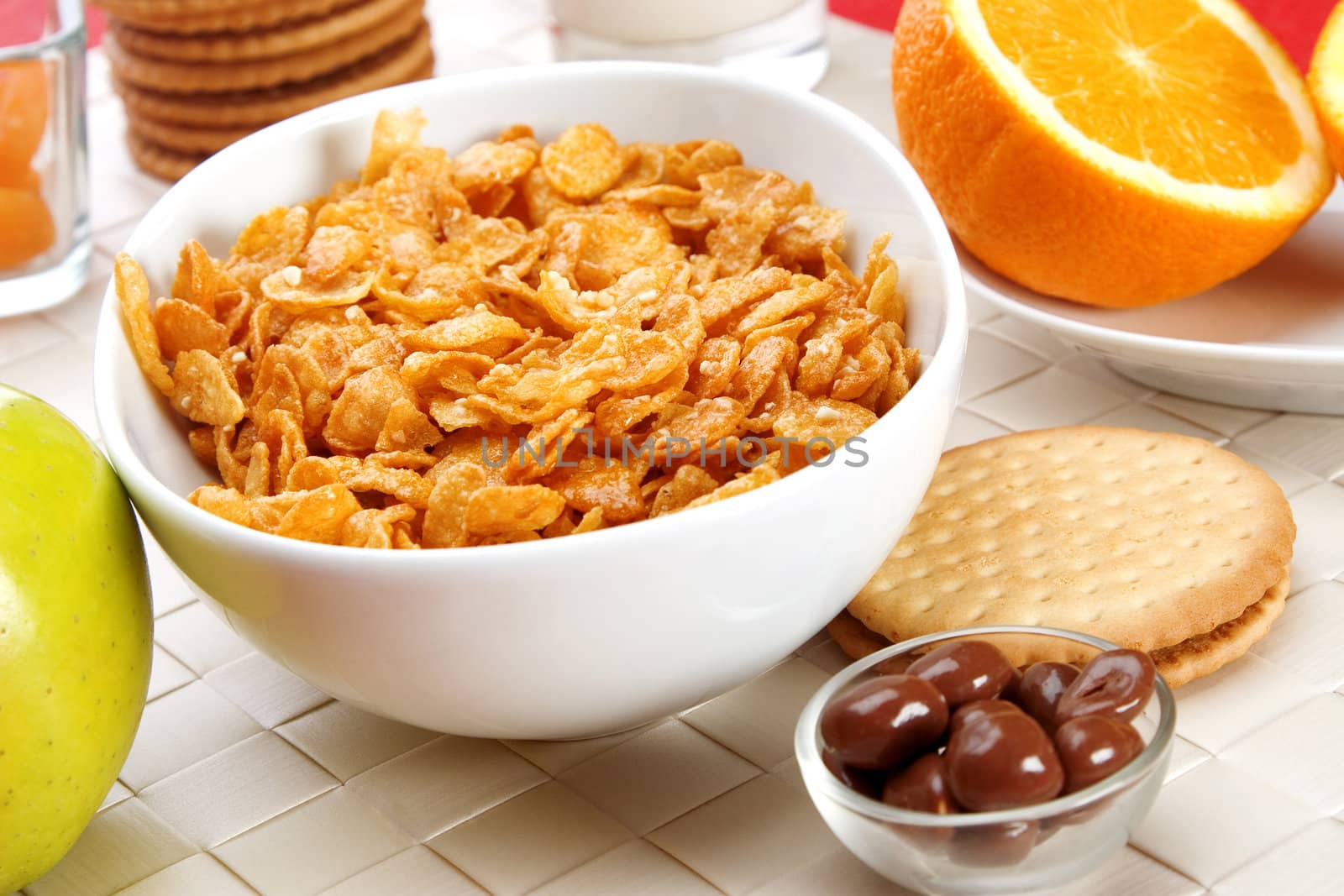 Delicious breakfast foods, cereals, fruits milk and biscuits