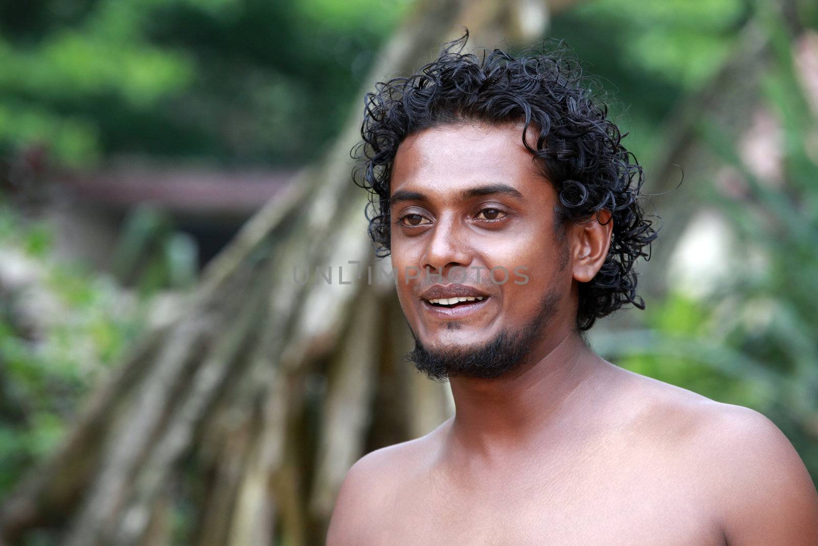 Portrait young men on a green background. Sri Lanka