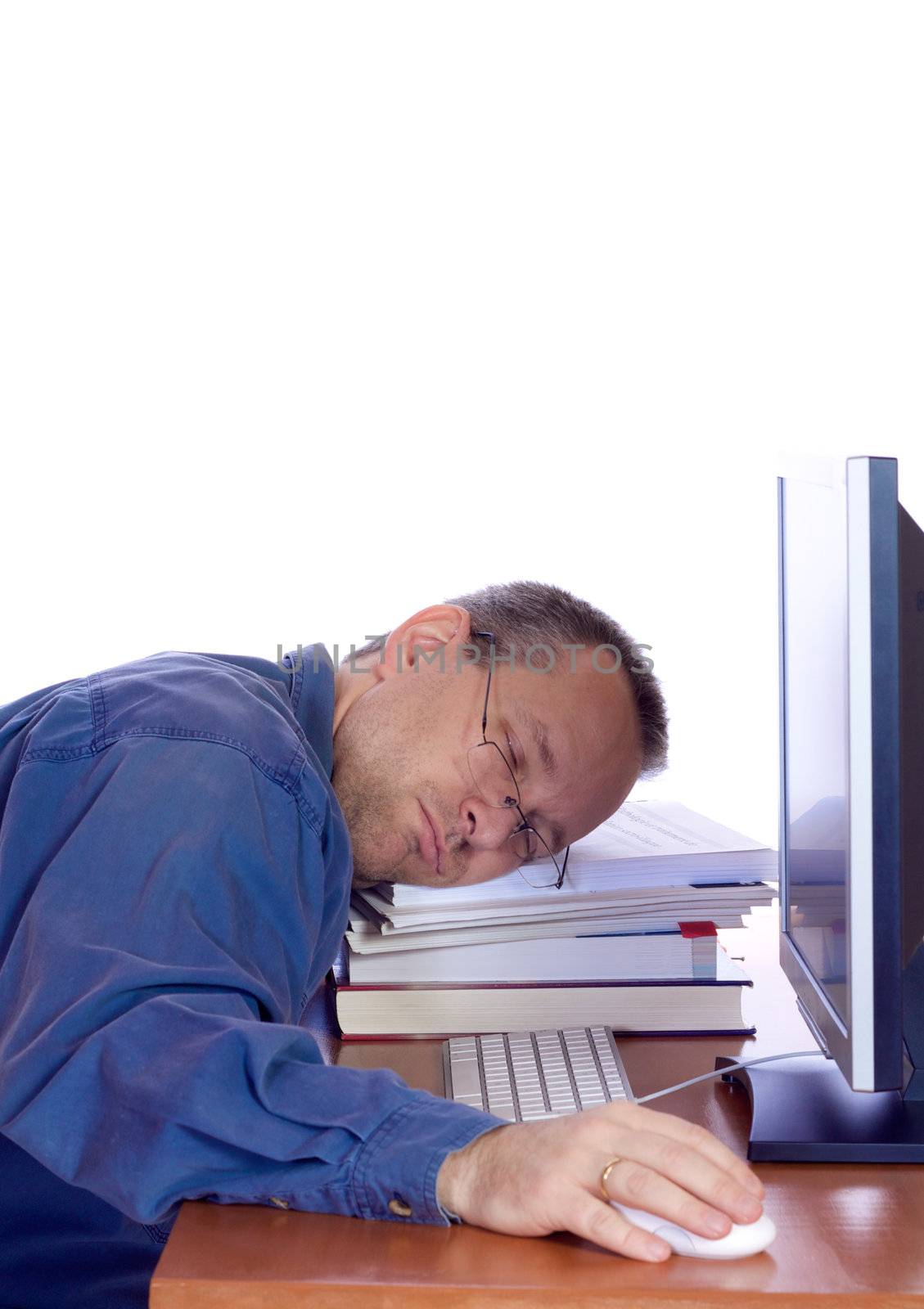 Man asleep on his computer keyboard