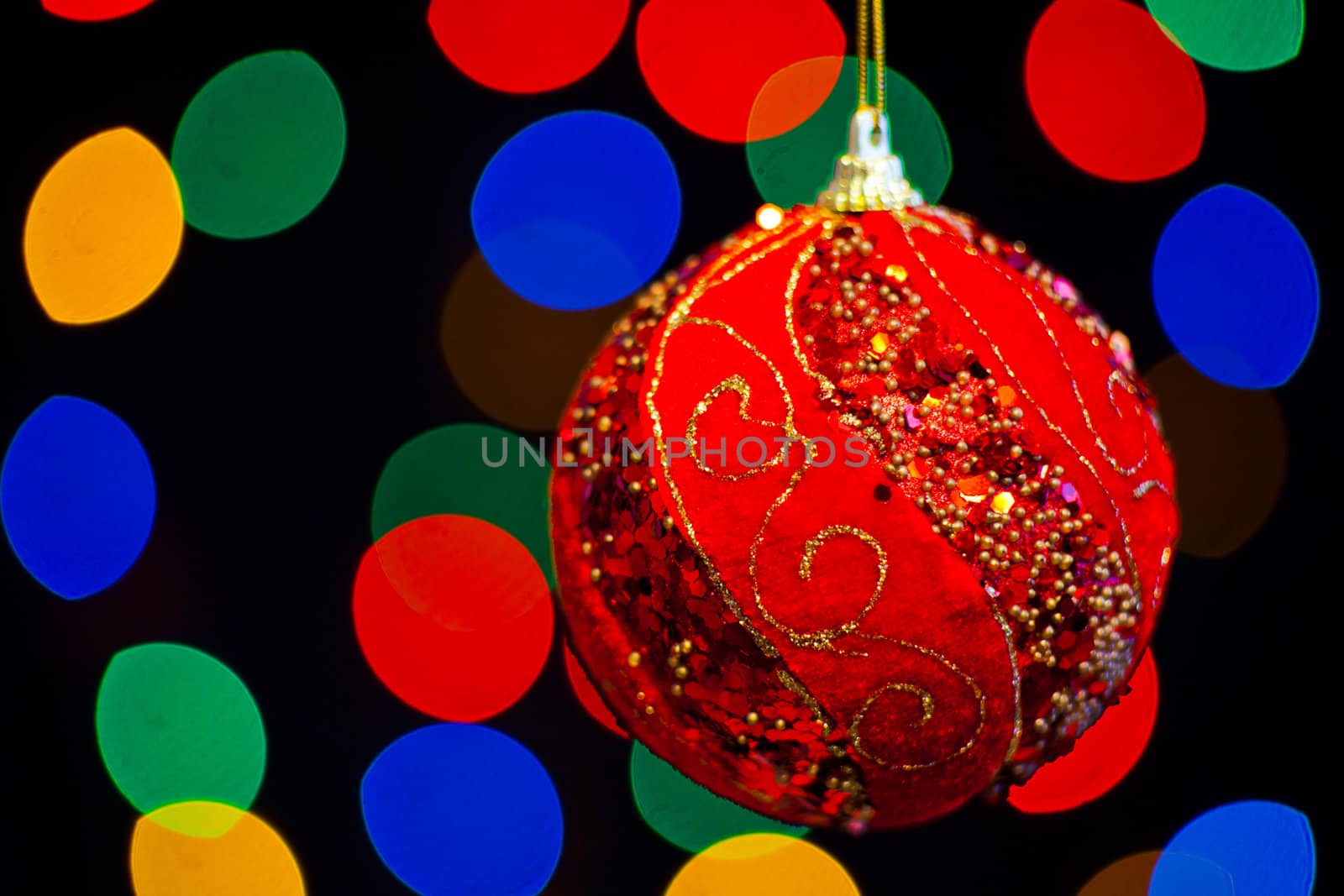 Red Christmas ball with lots of colors light
