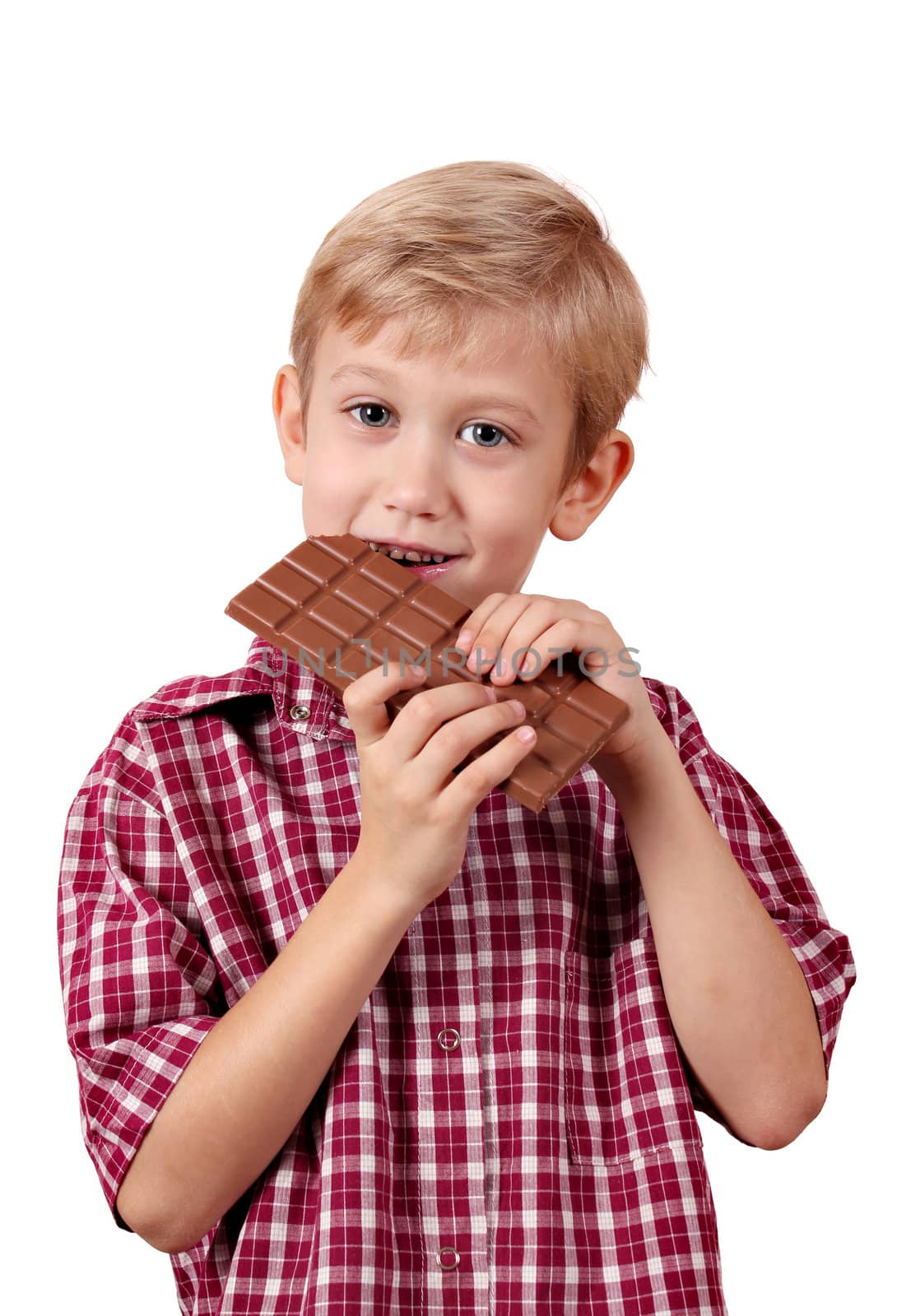 boy eats chocolate by goce