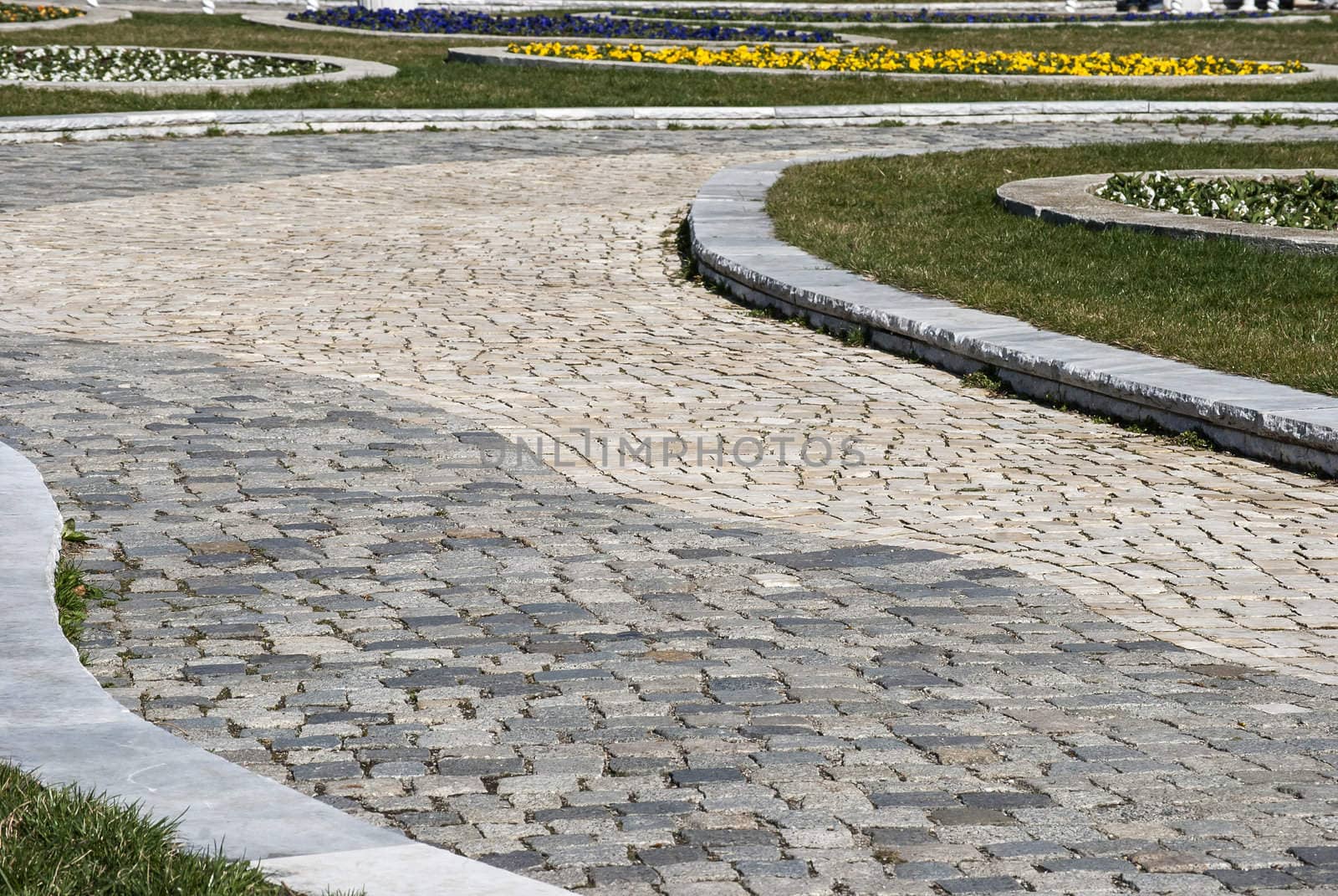 Paved park alley closeup by varbenov