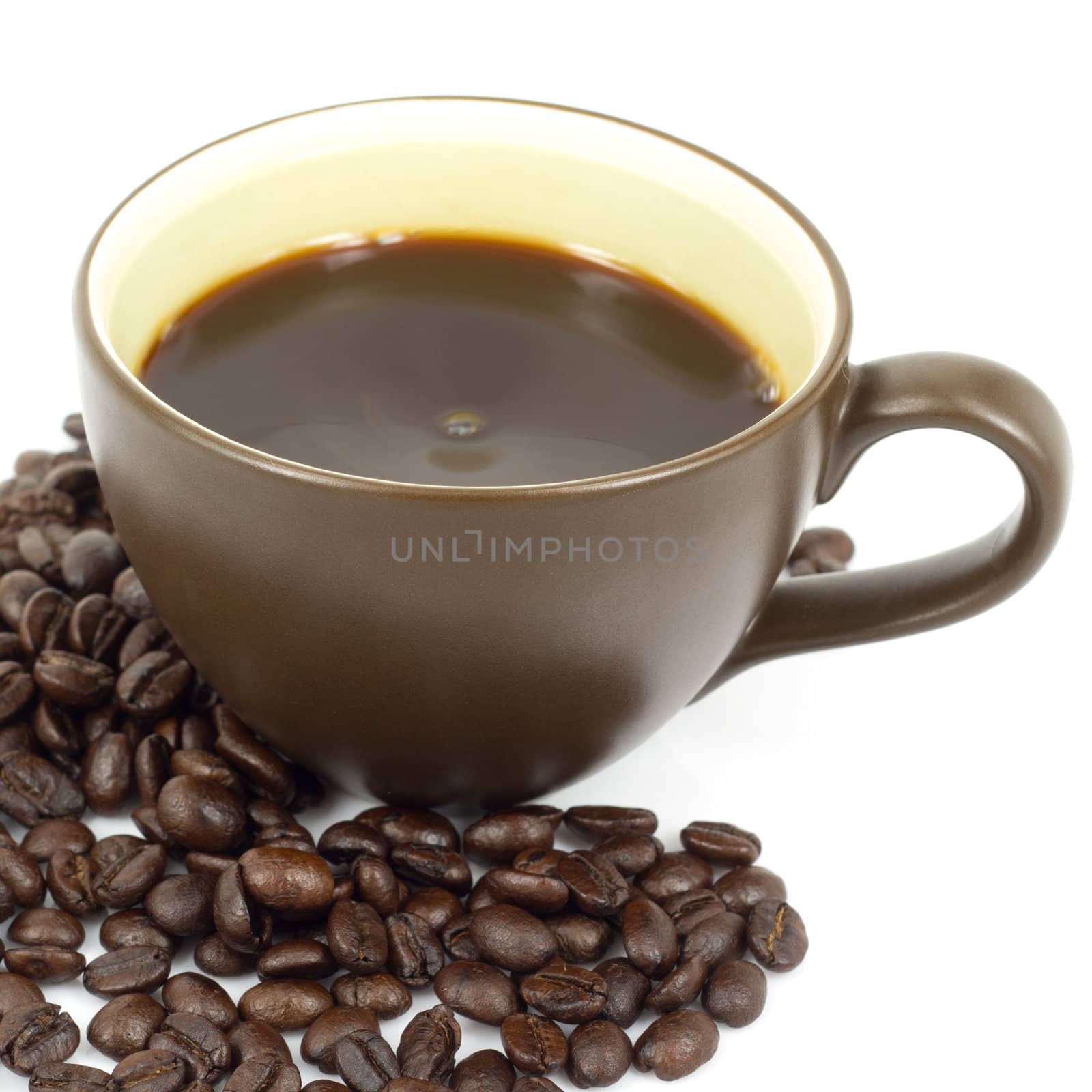 cup of hot coffee and coffee beans in white background