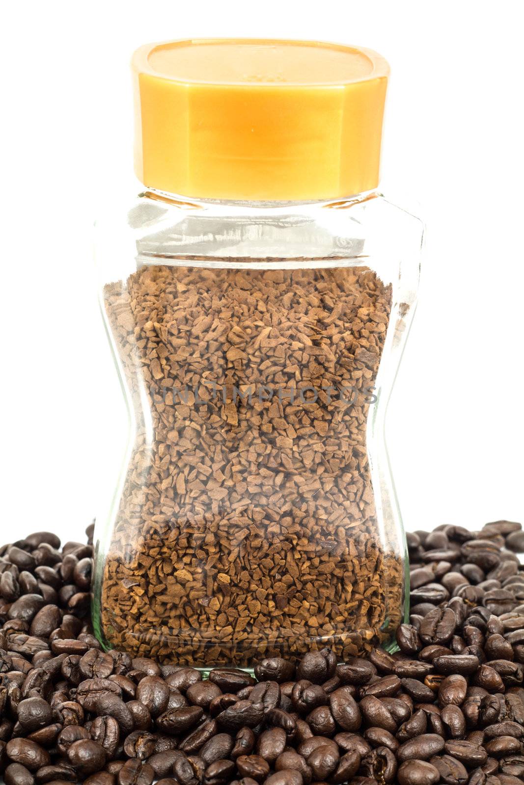 instant coffee bottle on white background and coffee beans