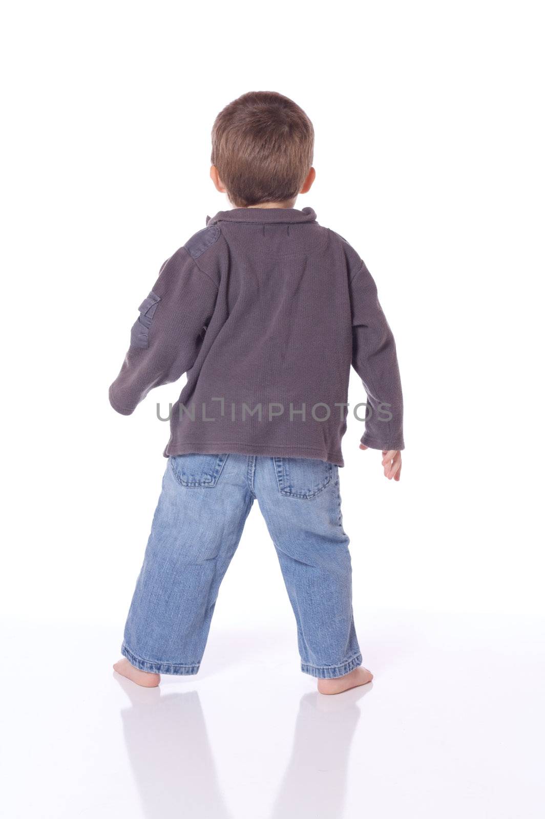 Cute little boy dancing and playing