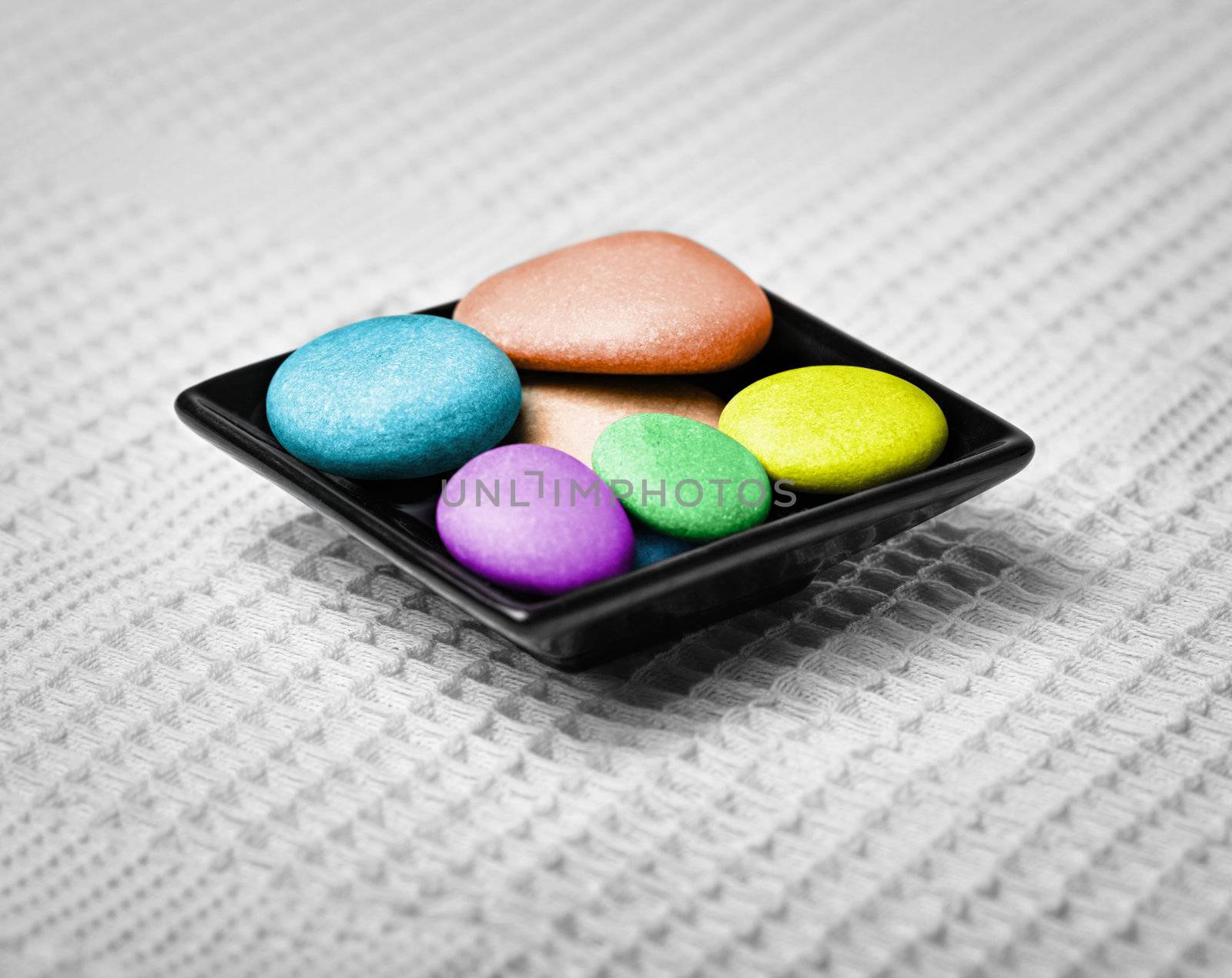 Colored pebbles in a small bowl - Spa