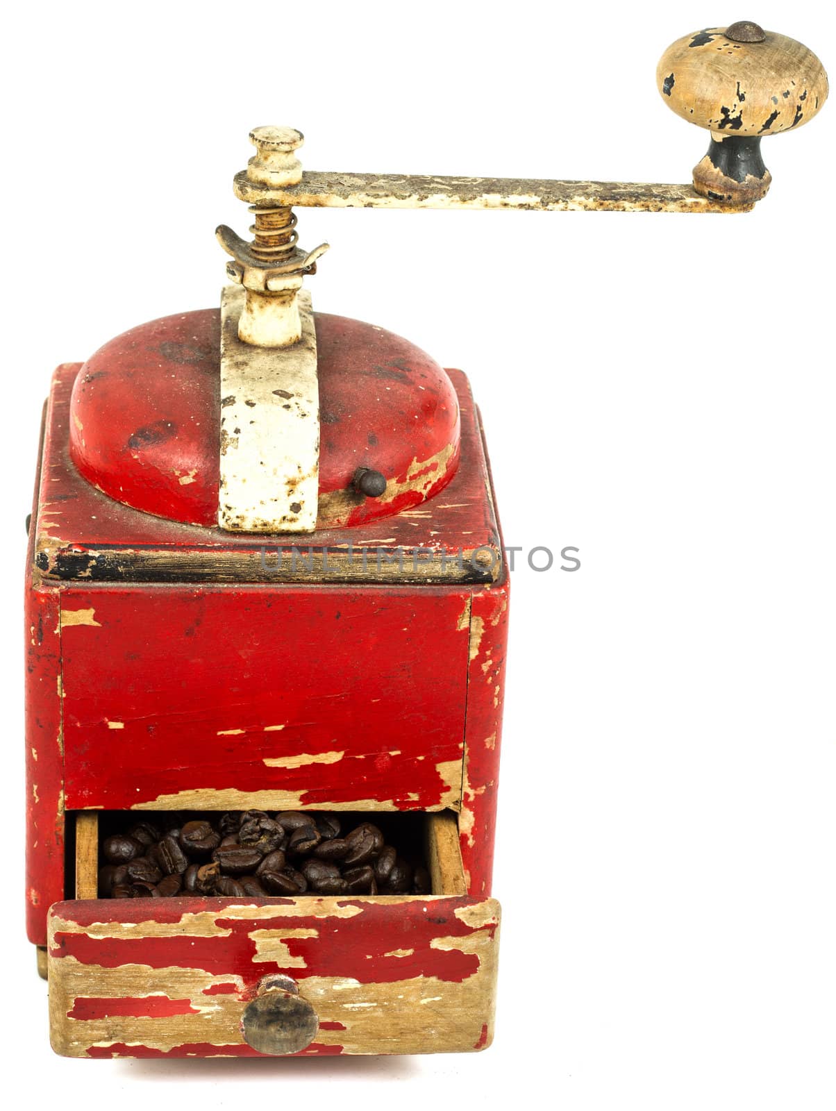 vintage coffee grinder with coffee on white background